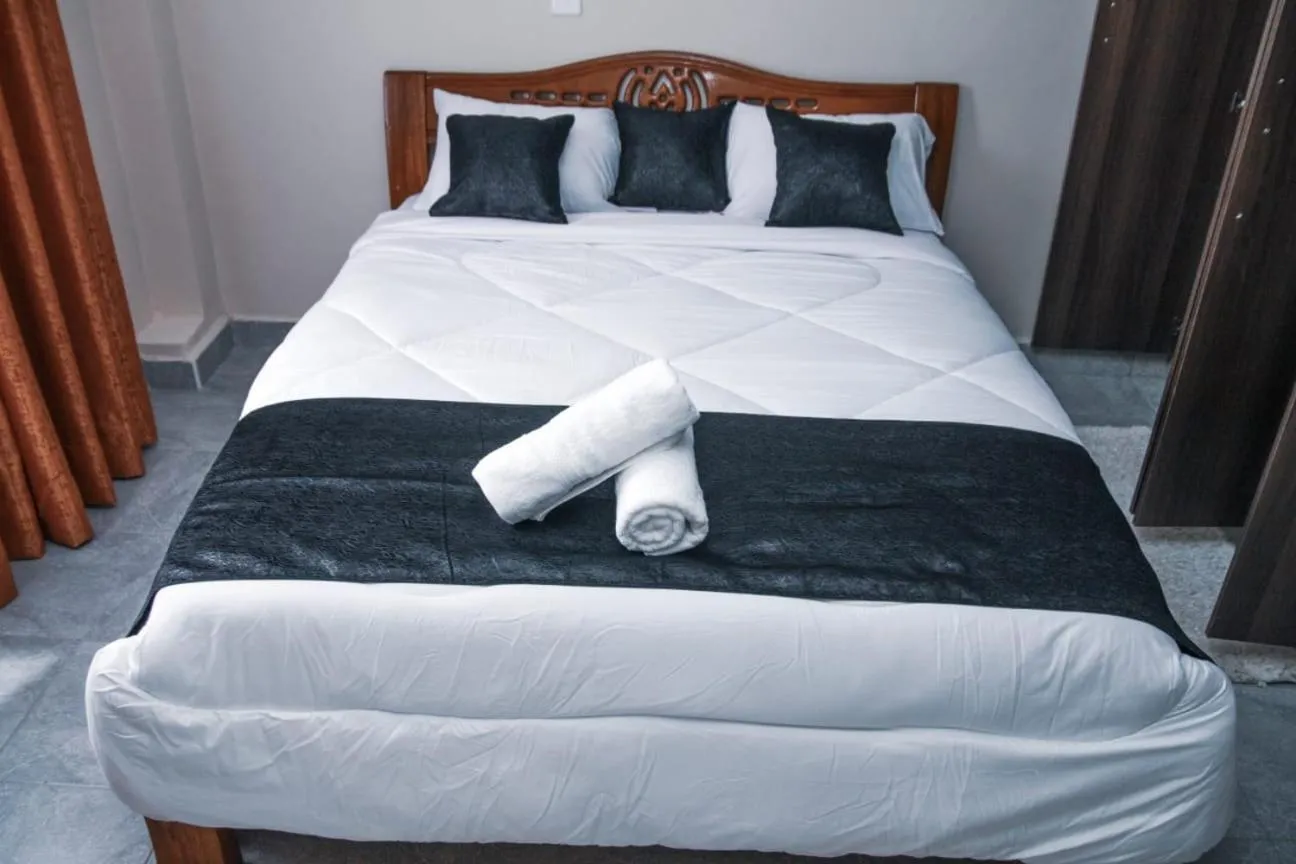Bed in Lux Suites Milimani Furnished Apartments