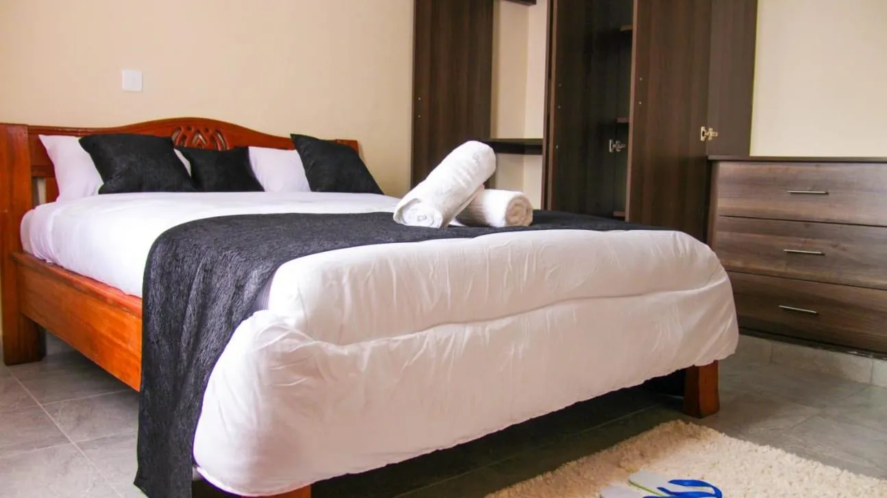 Bed in Lux Suites Milimani Furnished Apartments