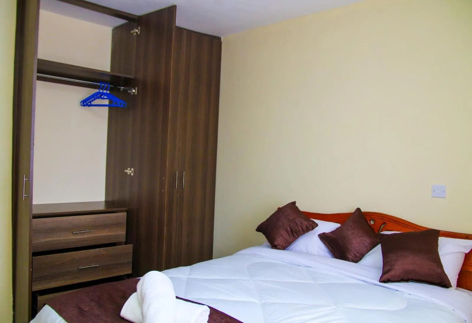 Bed in Lux Suites Milimani Furnished Apartments