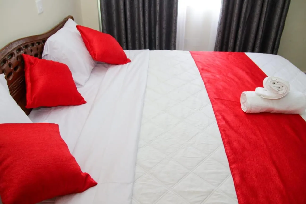 Bed in Lux Suites Milimani Furnished Apartments