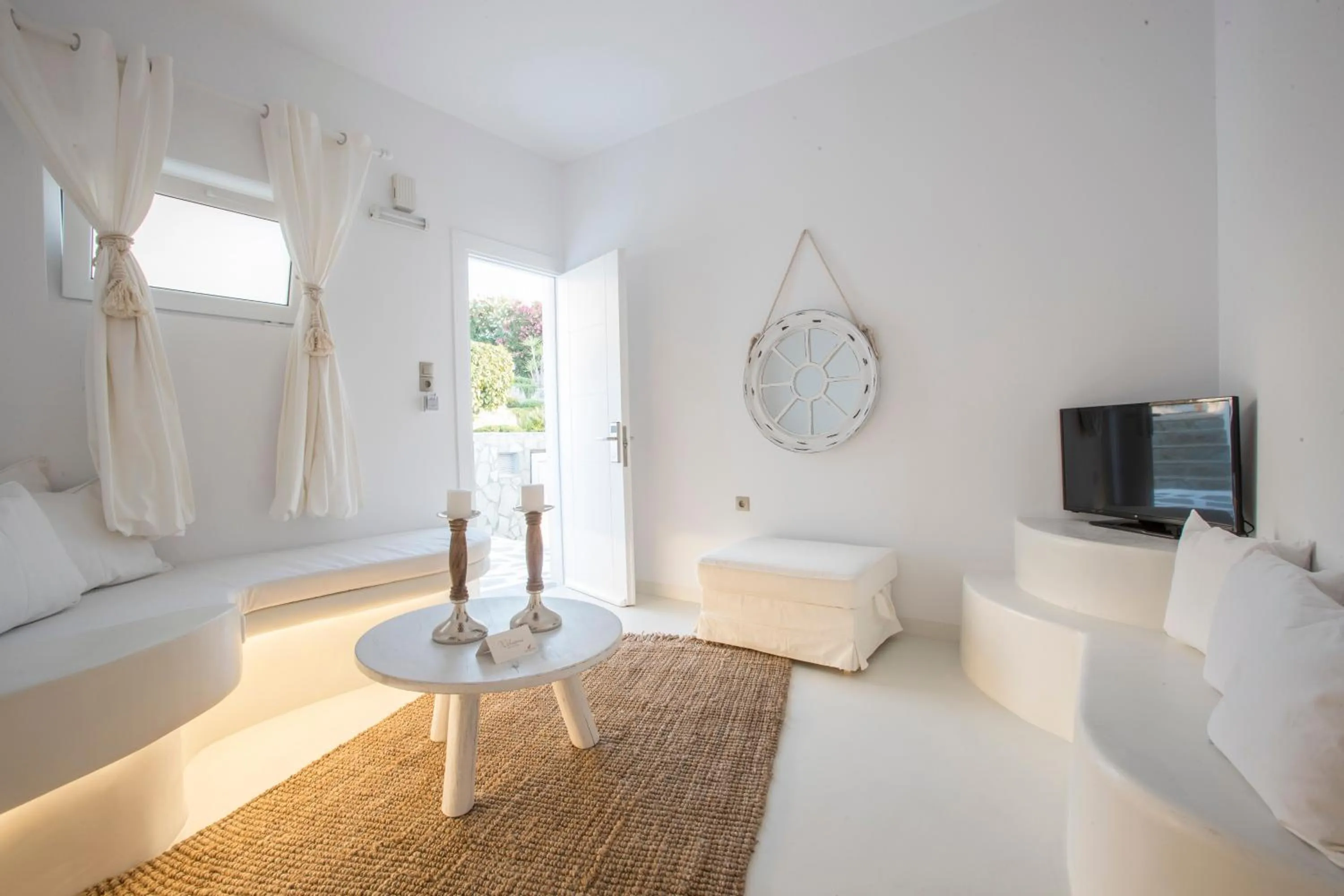 Living room, Bed in Paros Palace - Adults Only