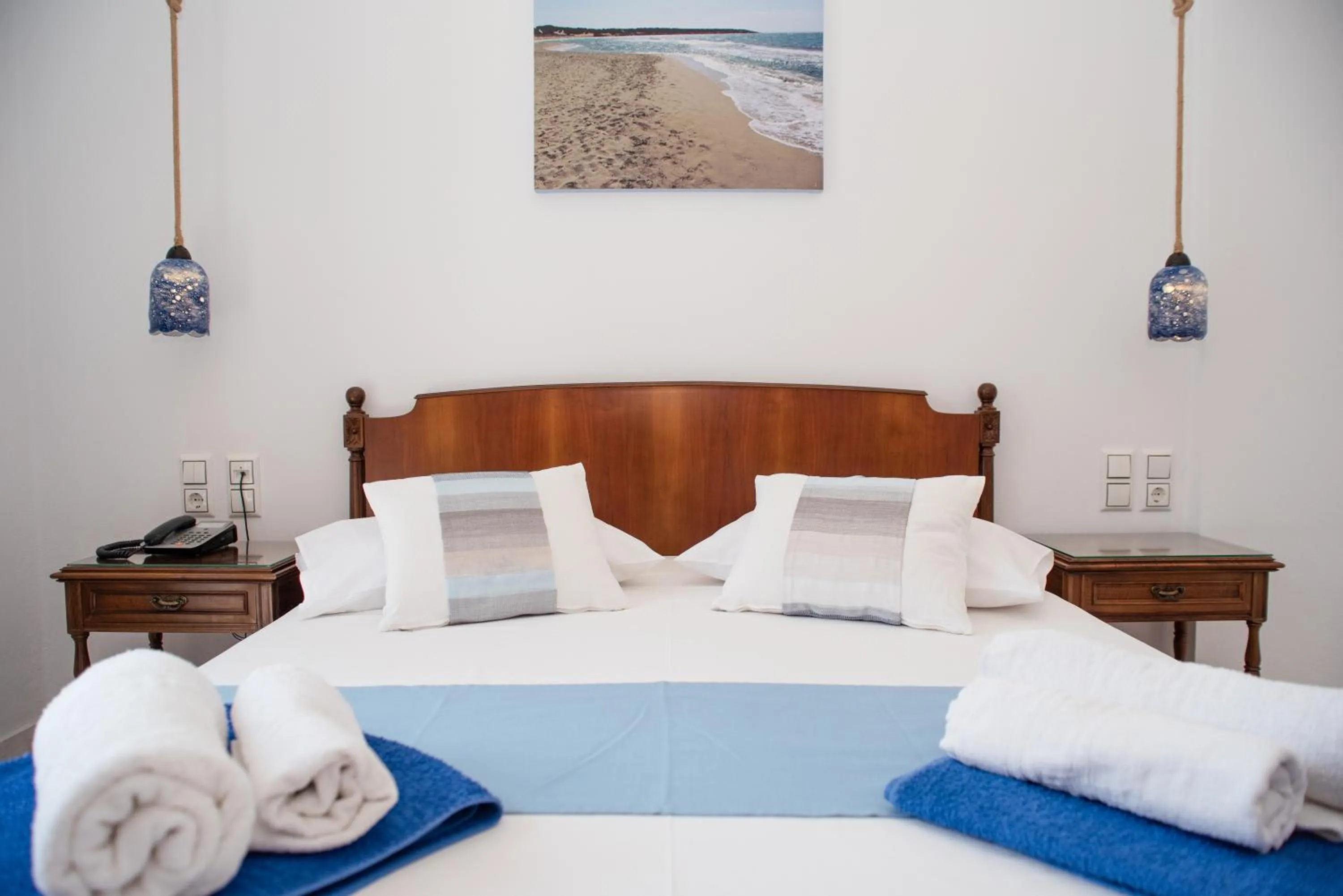 Bed in Adonis Hotel Naxos
