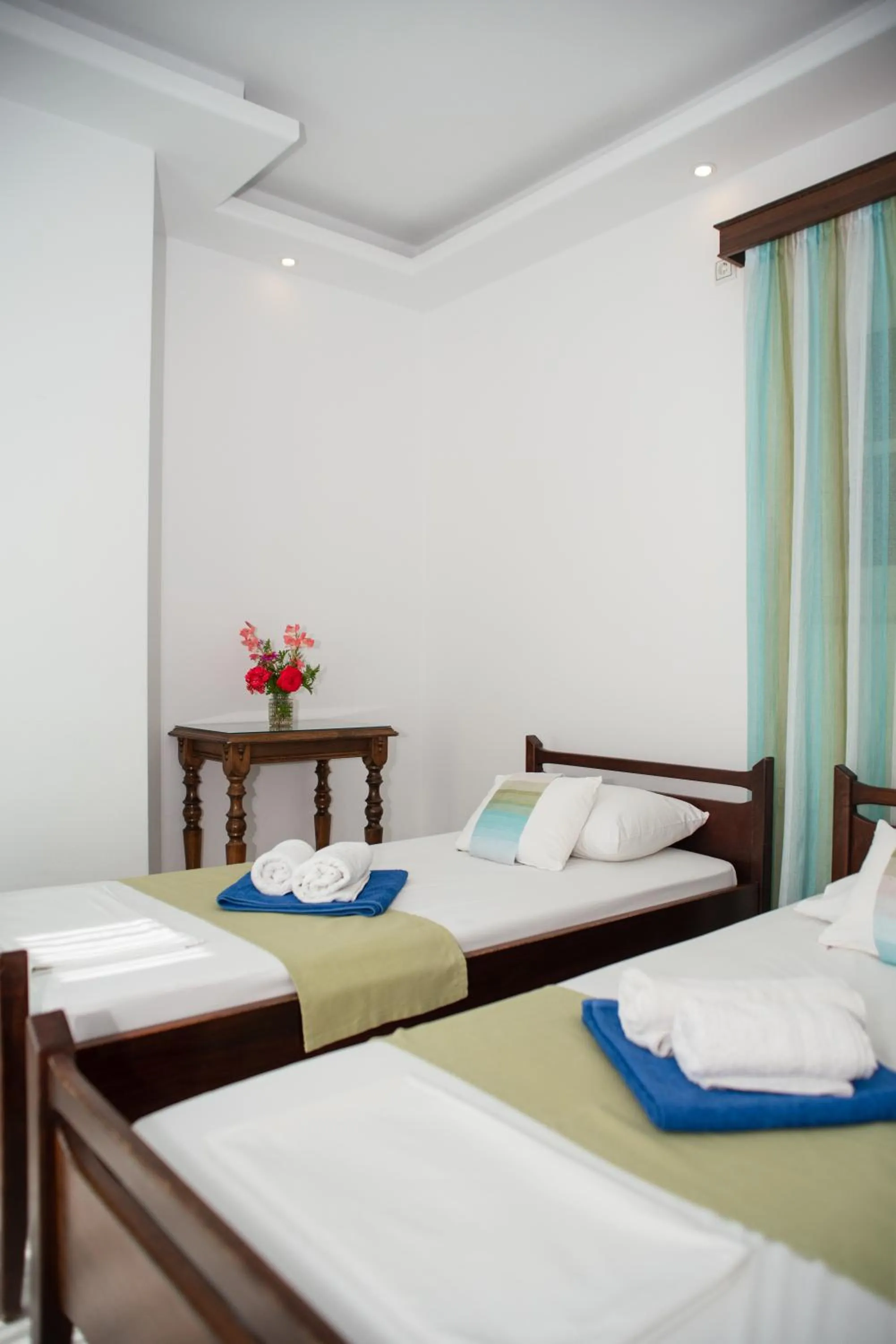 Bed in Adonis Hotel Naxos