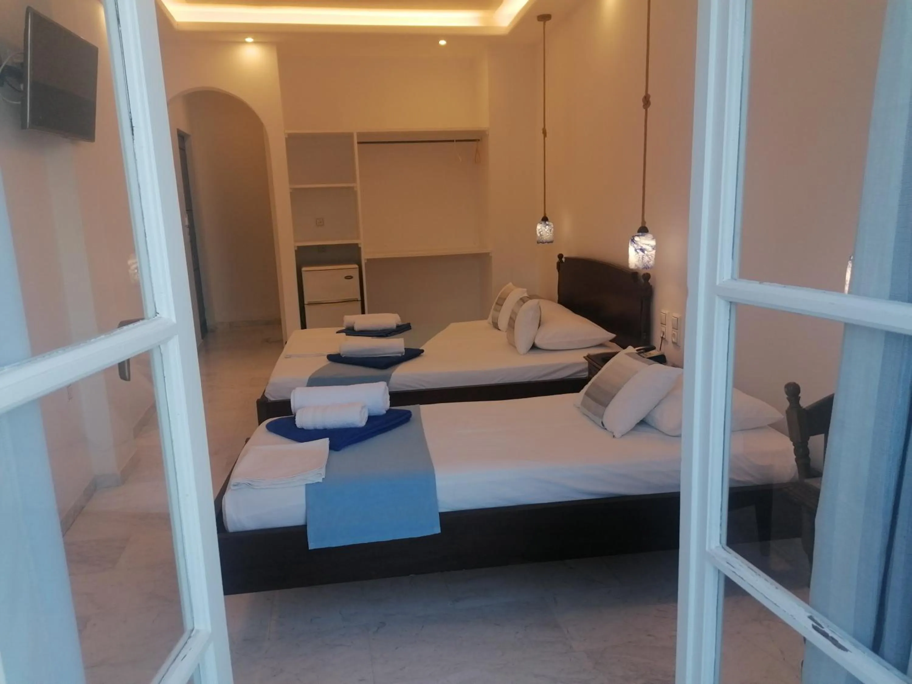 Bed in Adonis Hotel Naxos