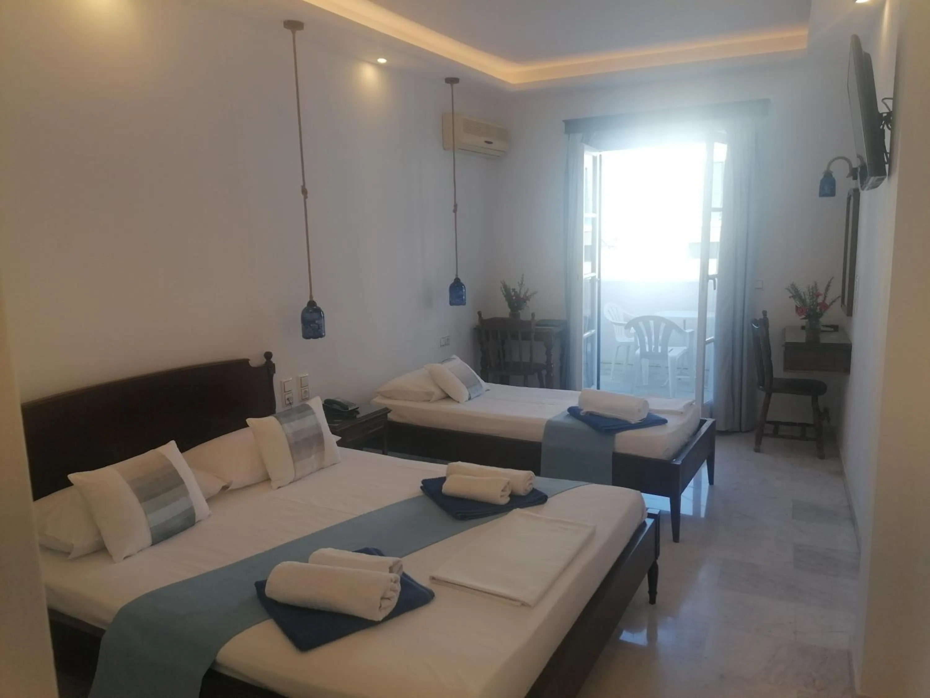 Bed in Adonis Hotel Naxos