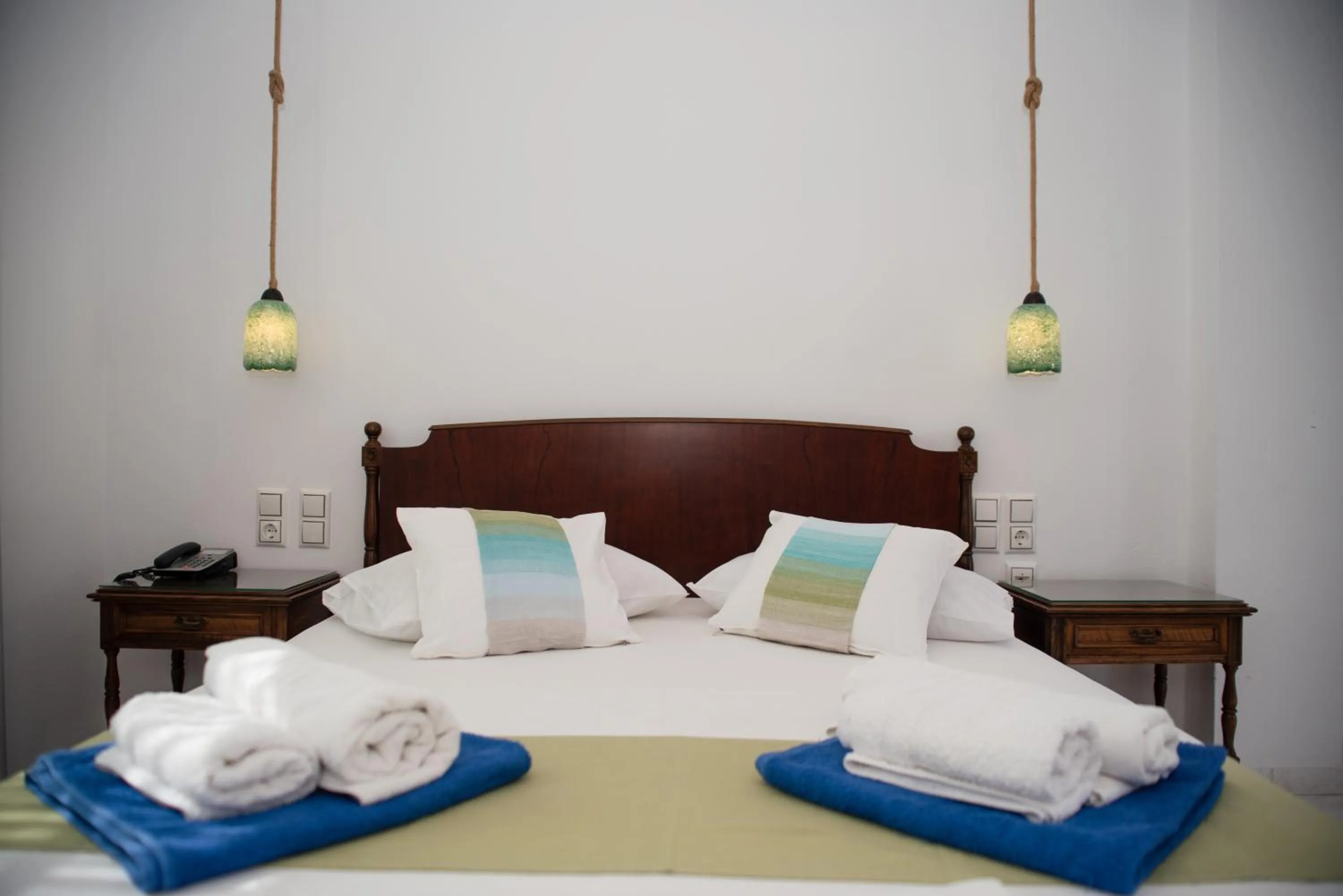 Bed in Adonis Hotel Naxos