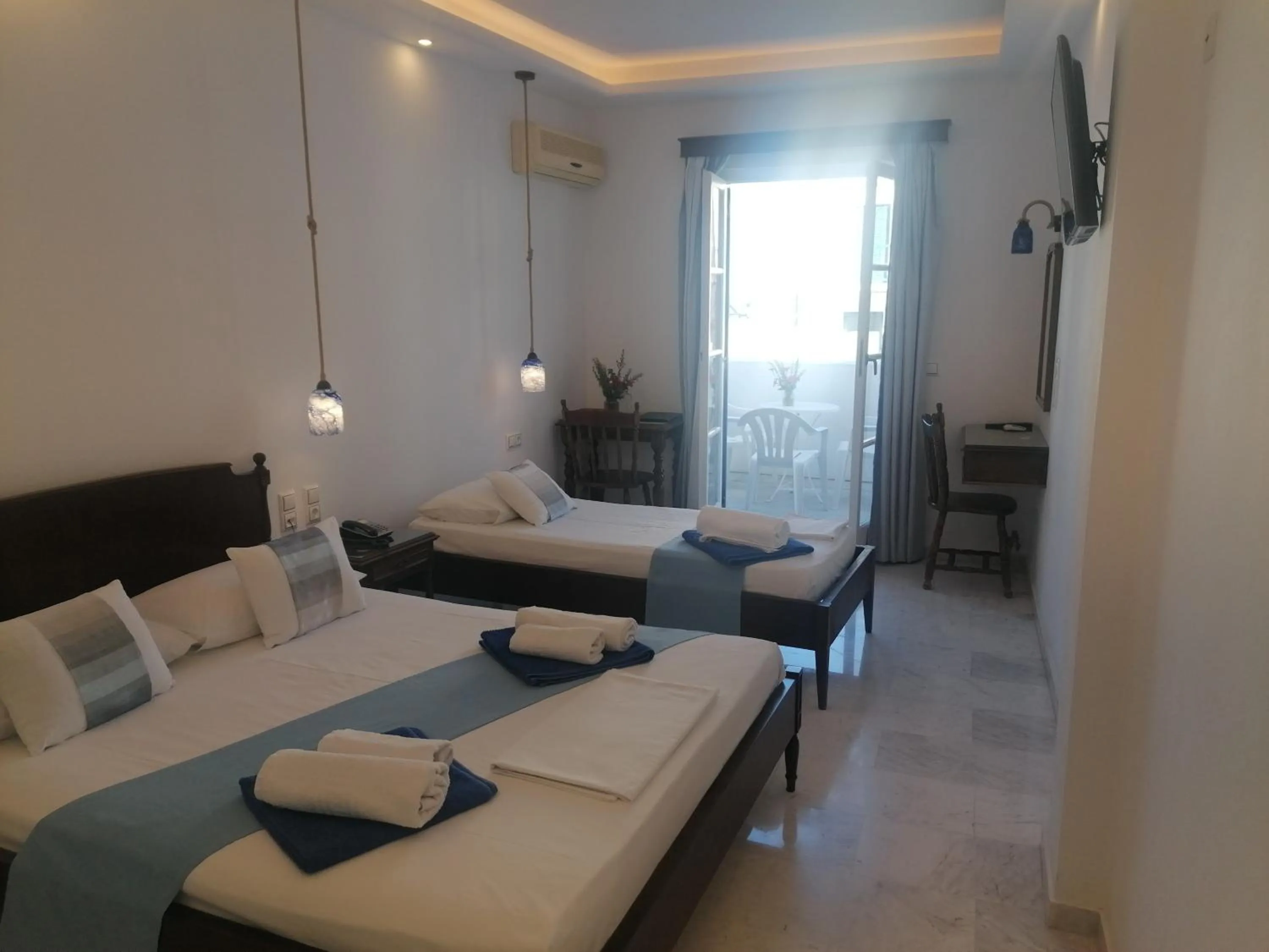 Bed in Adonis Hotel Naxos