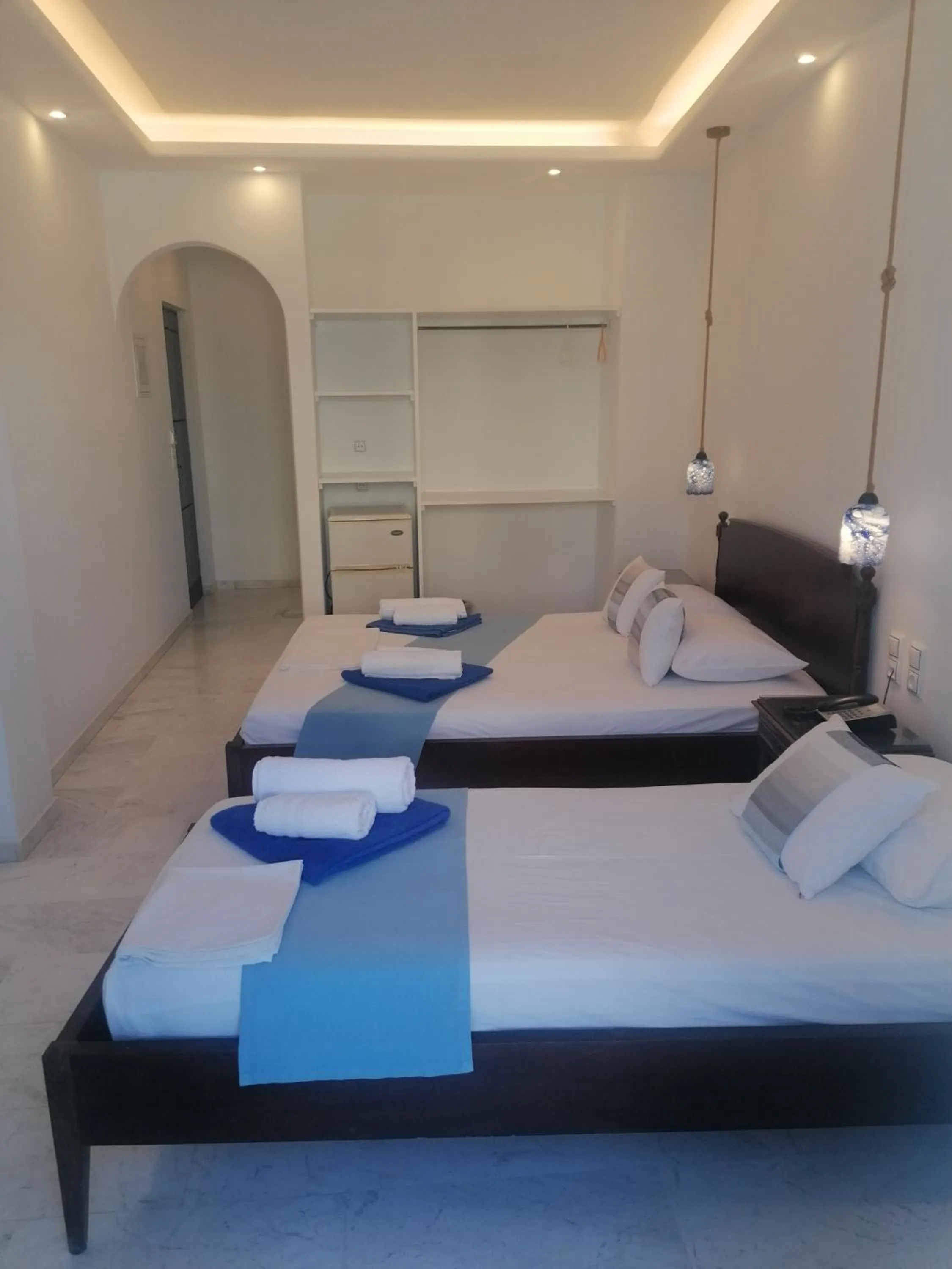 Bed in Adonis Hotel Naxos