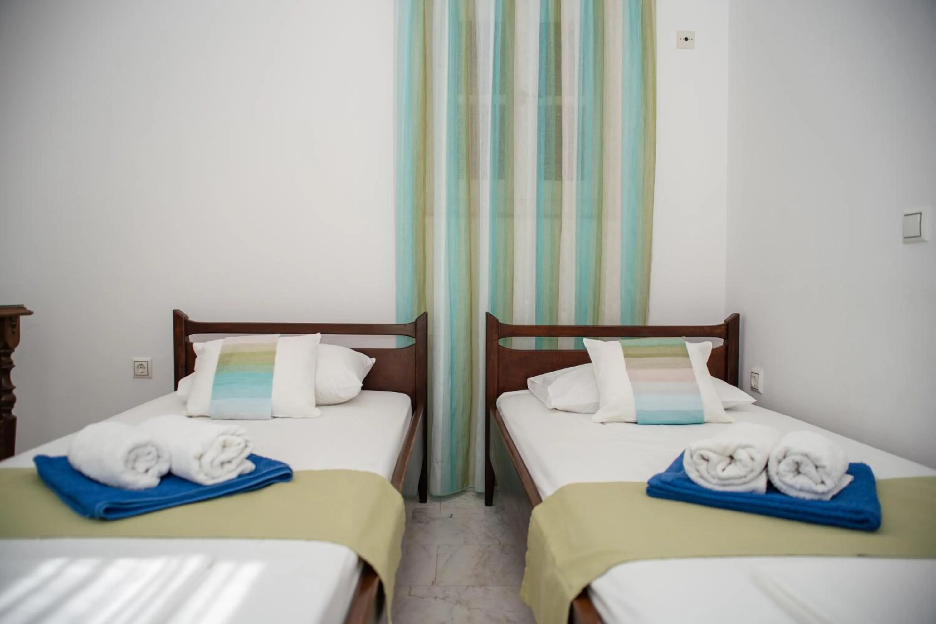 Bed in Adonis Hotel Naxos