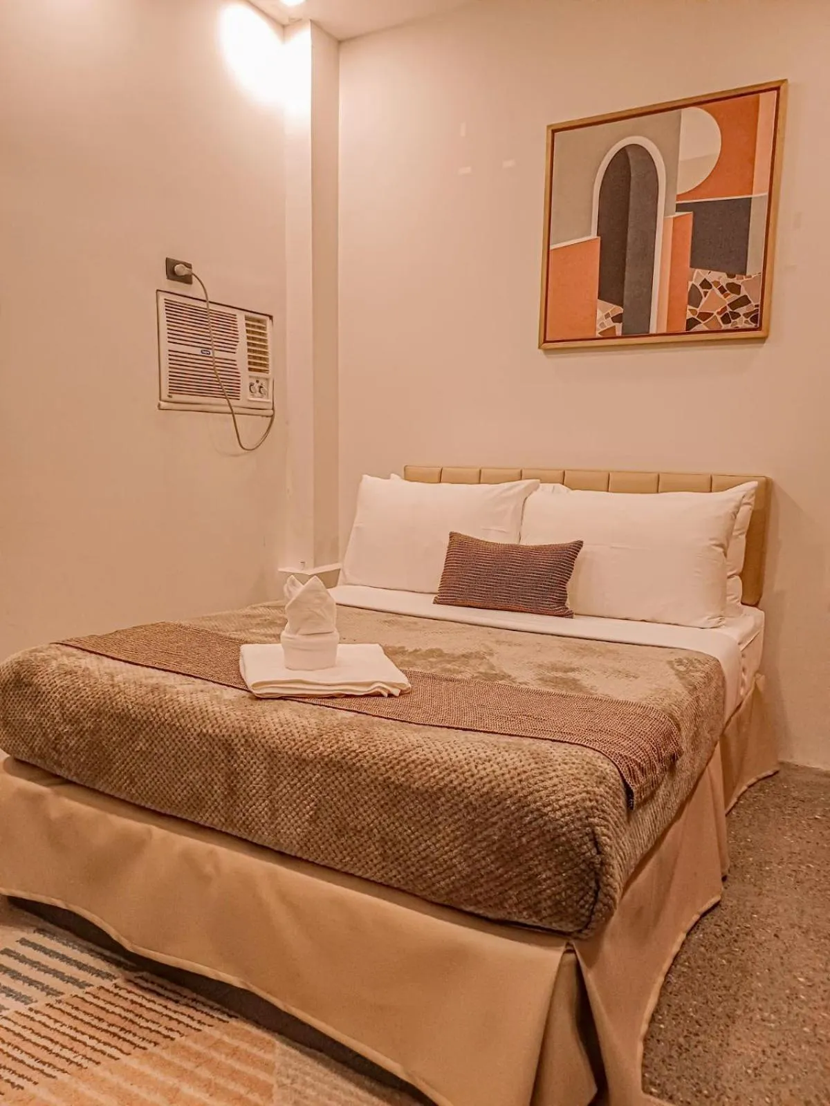 Bed in Prince Express Inn