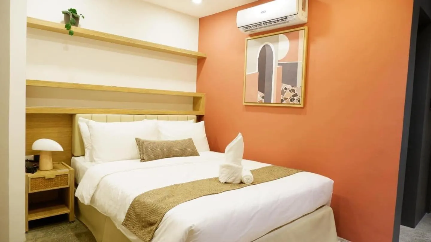 Bed in Prince Express Inn