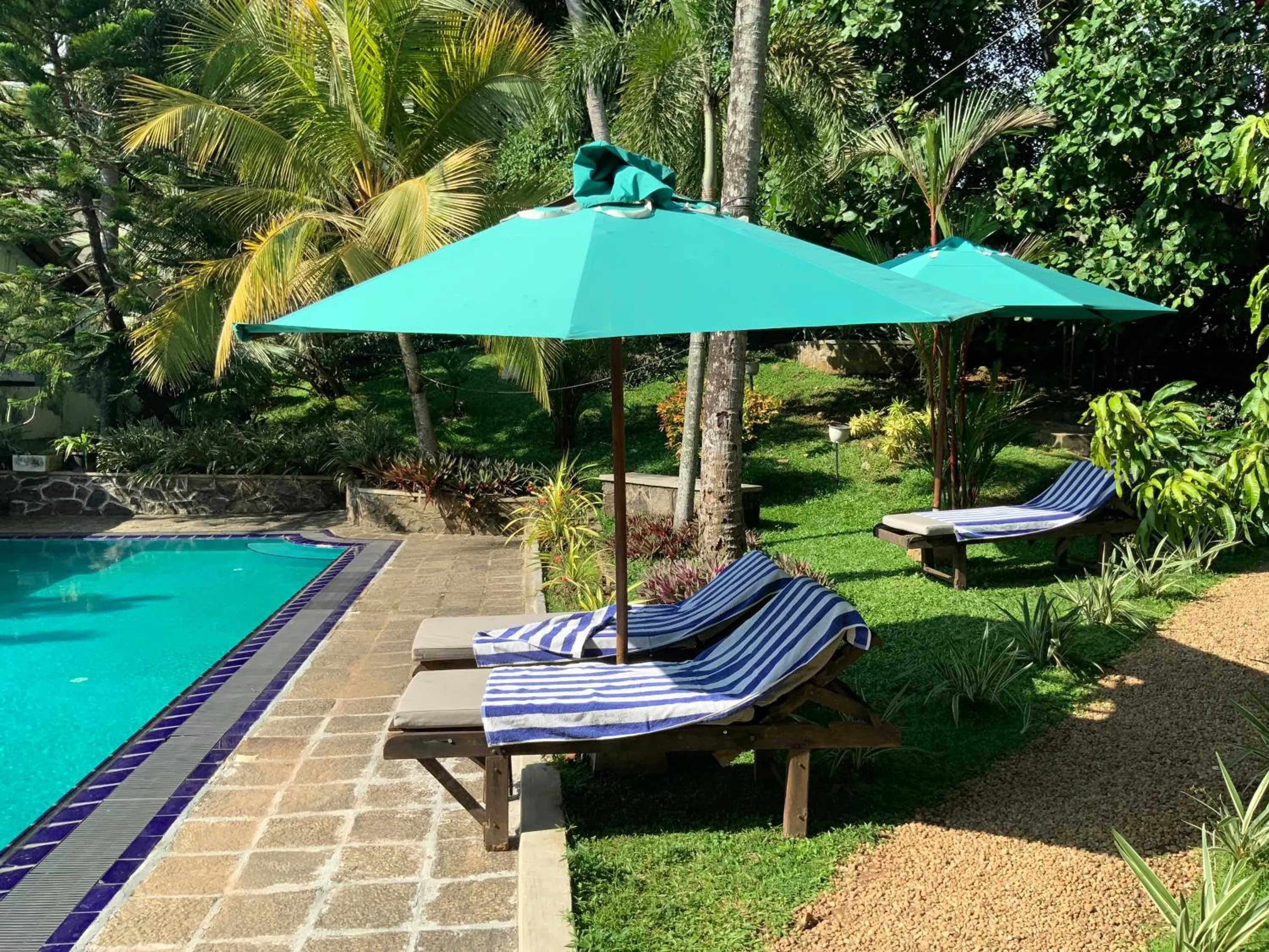 Swimming pool in Lali Villa & Fruit Garden