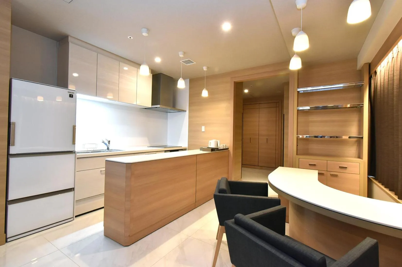 Kitchen or kitchenette in Odysis Suites Osaka Airport Hotel