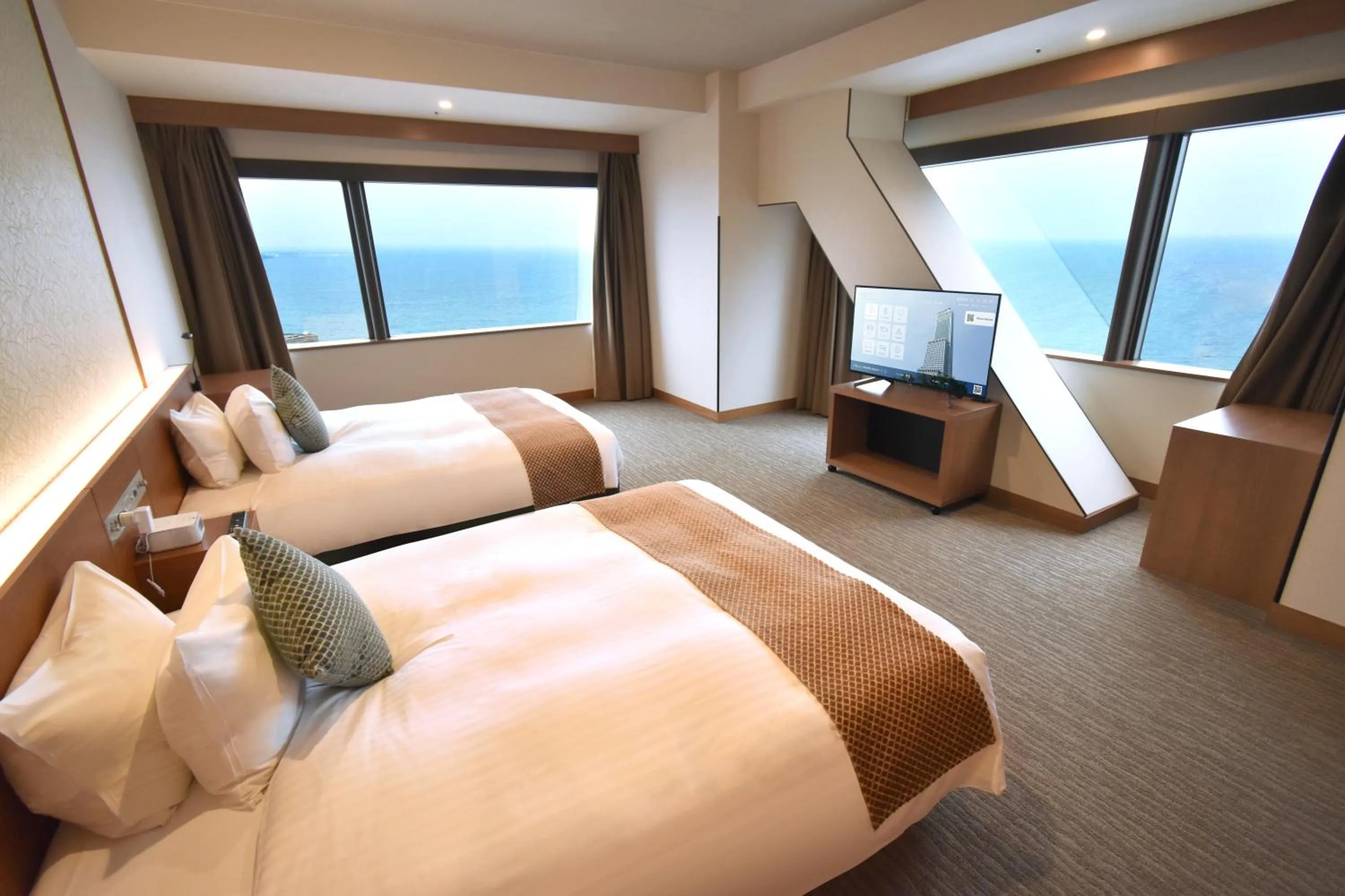 Photo of the whole room, Bed in Odysis Suites Osaka Airport Hotel