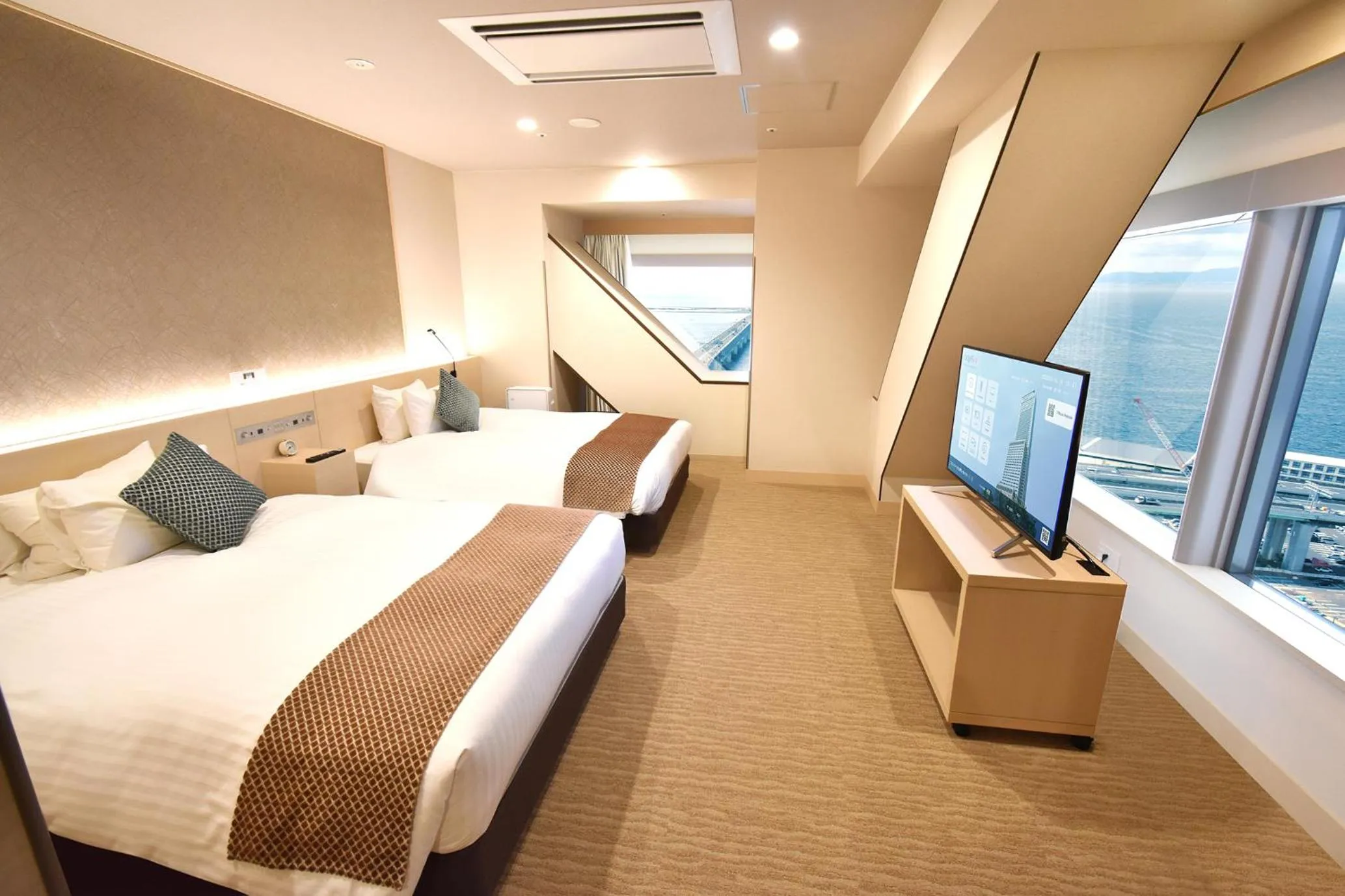 Photo of the whole room, Bed in Odysis Suites Osaka Airport Hotel