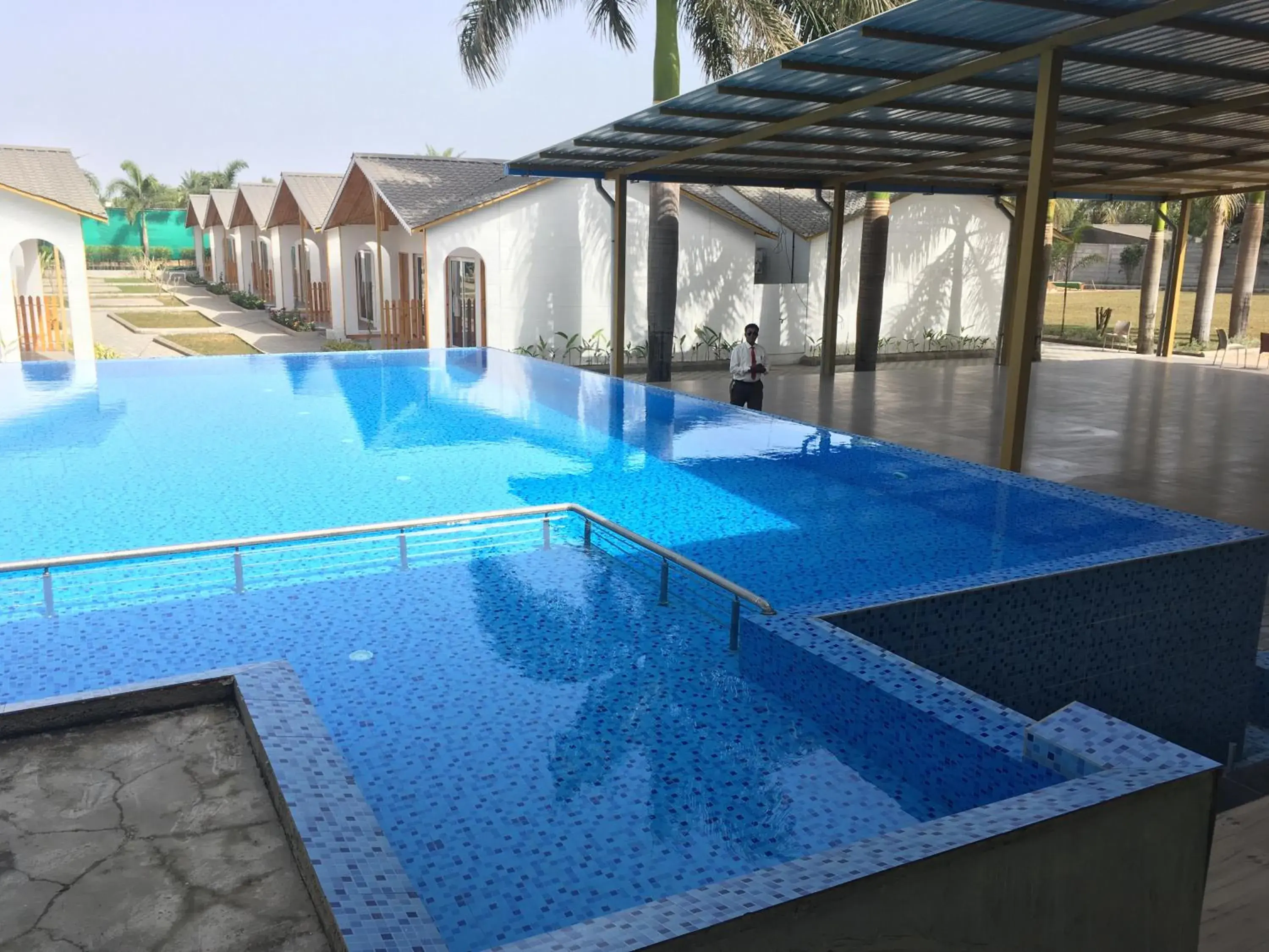 Swimming pool in VITS Daman Devka Beach Swimming pool in VITS Daman Devka Beach