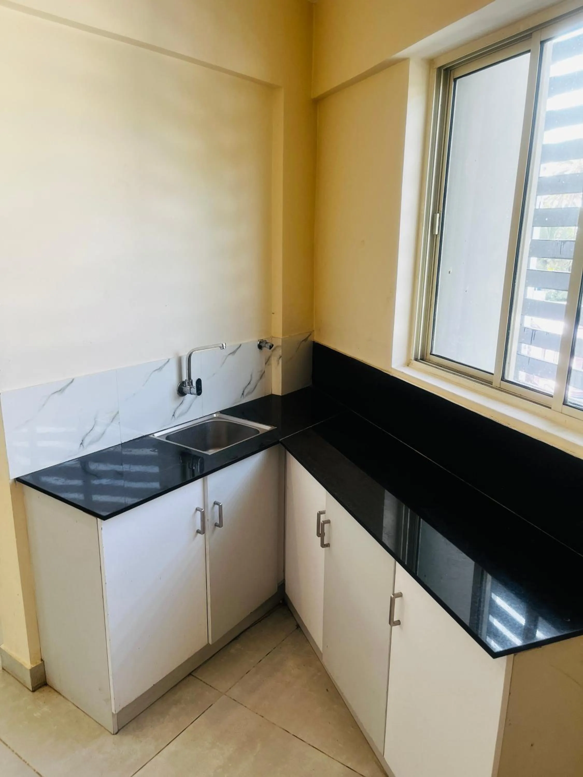 Kitchen or kitchenette in REGAL SUITES