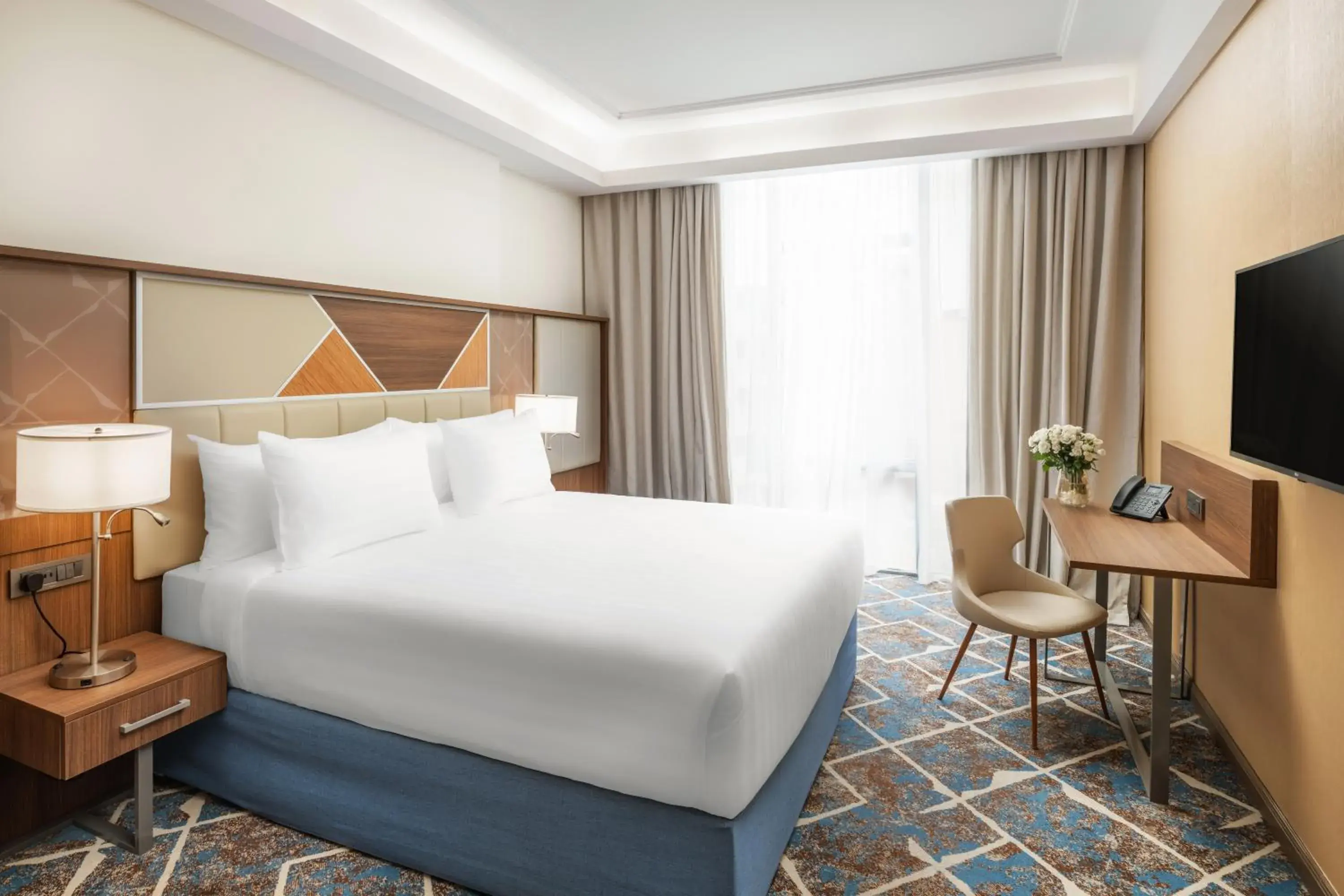 Bed in Three Pearls Musalli Hotel Bed in Three Pearls Musalli Hotel