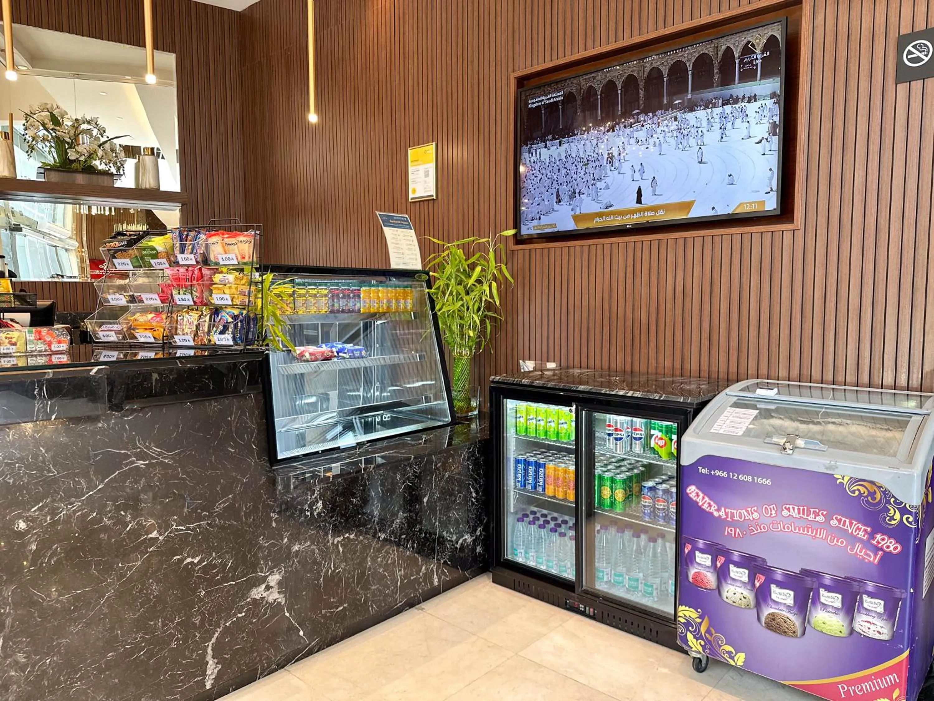 Lounge or bar in Three Pearls Musalli Hotel