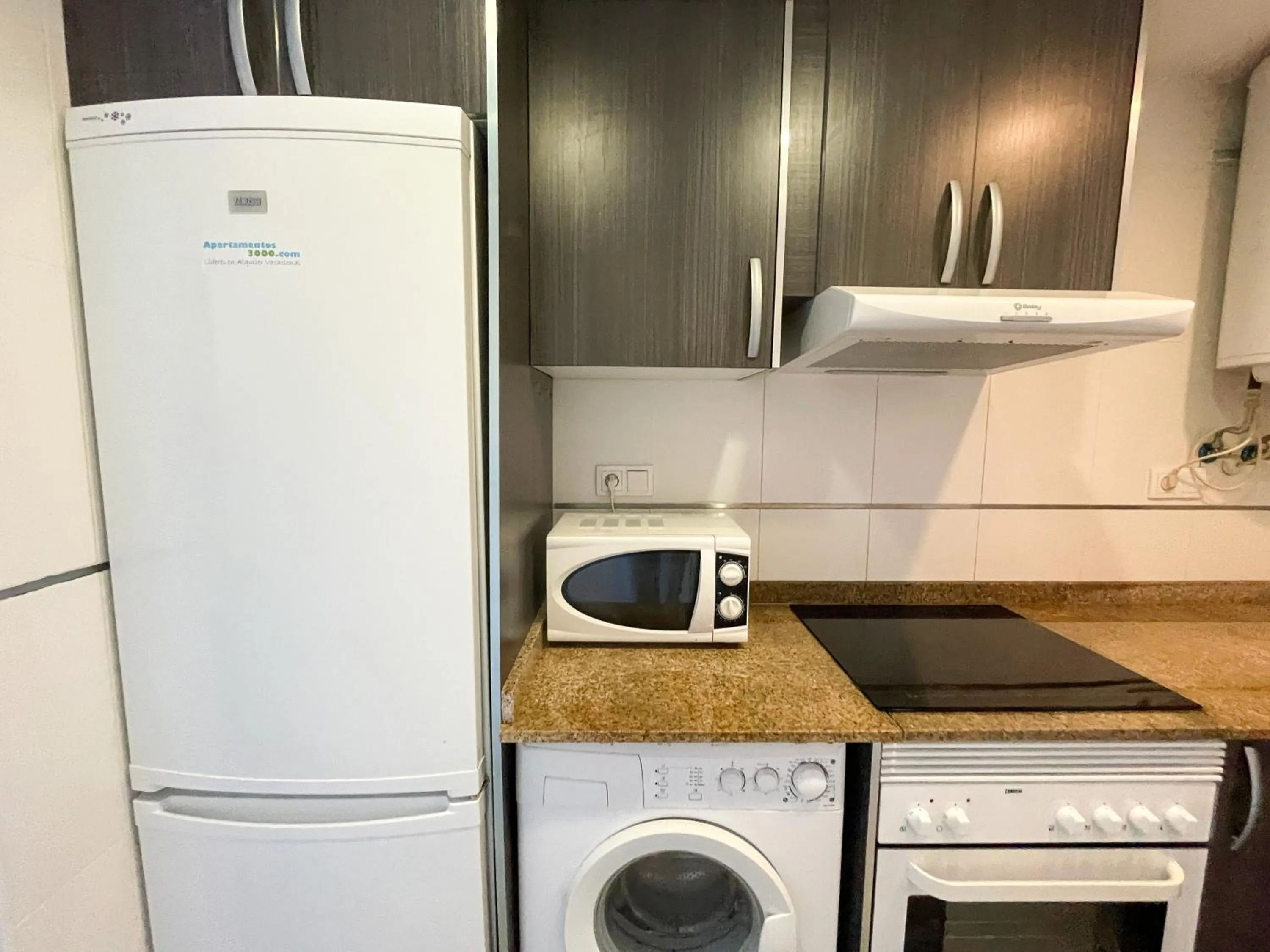 Kitchen or kitchenette in Apartamentos Mirador del Castillo 3000