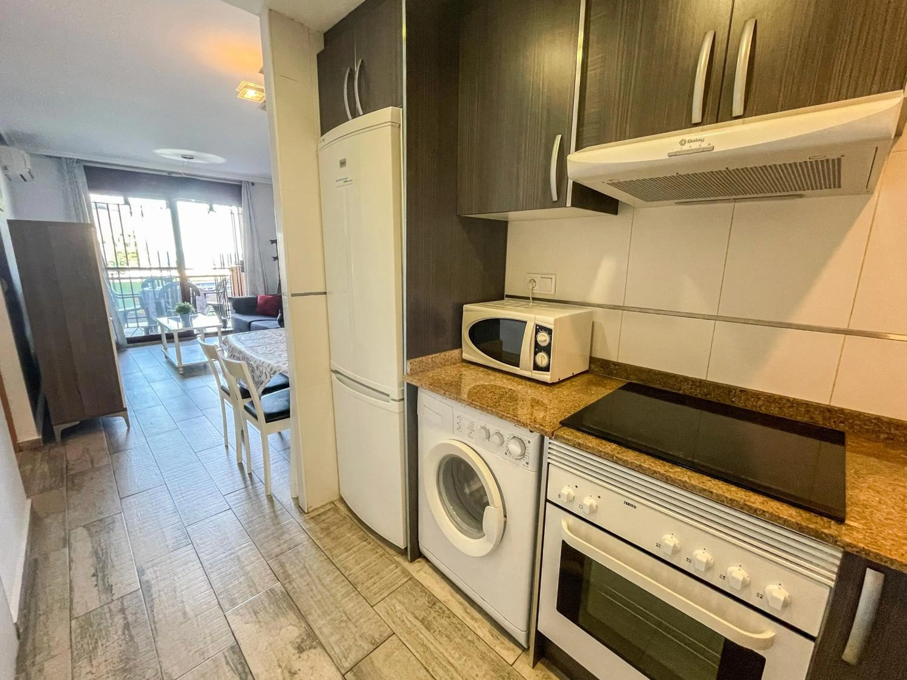 Kitchen or kitchenette in Apartamentos Mirador del Castillo 3000