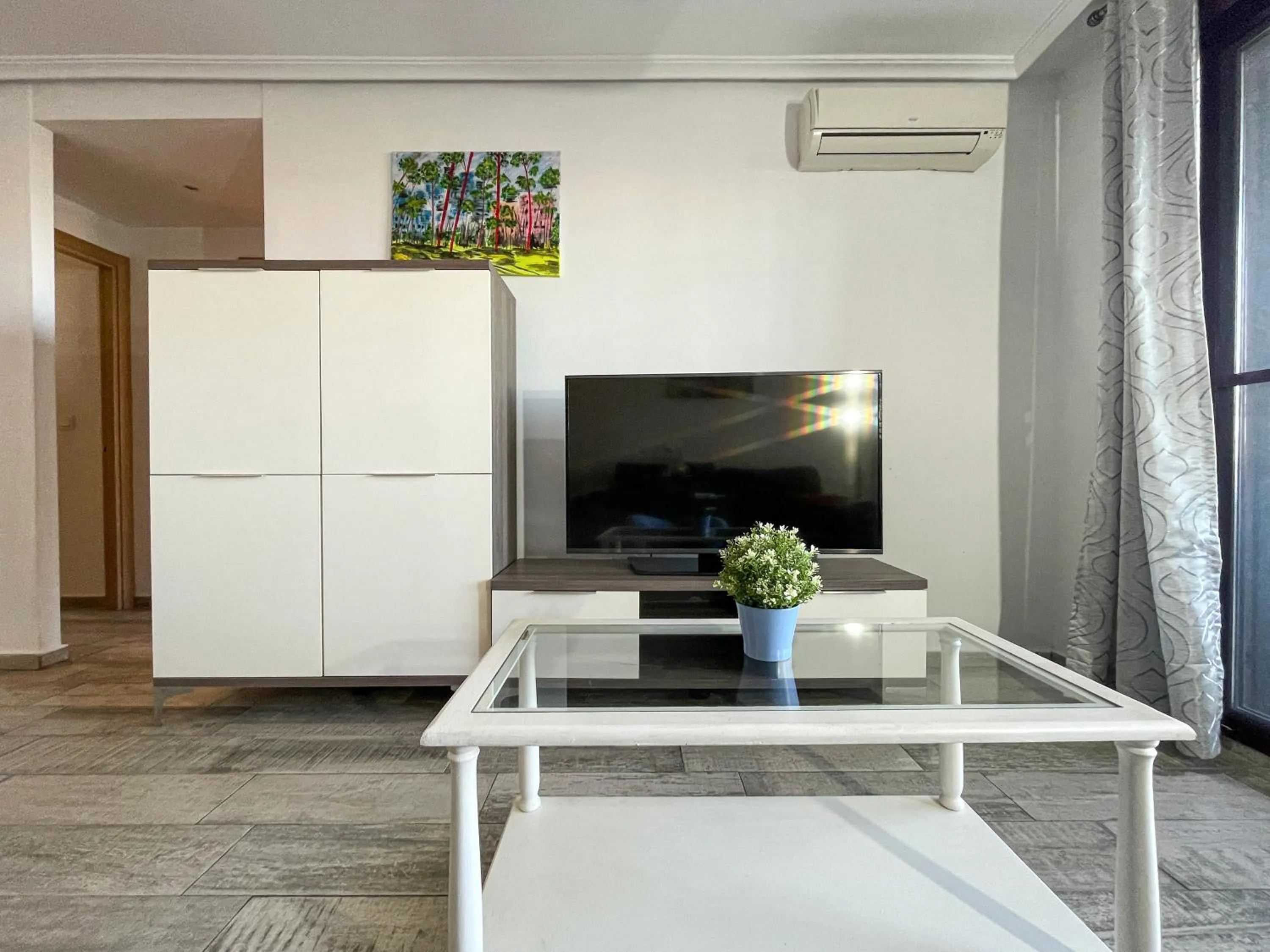 TV and multimedia in Apartamentos Mirador del Castillo 3000