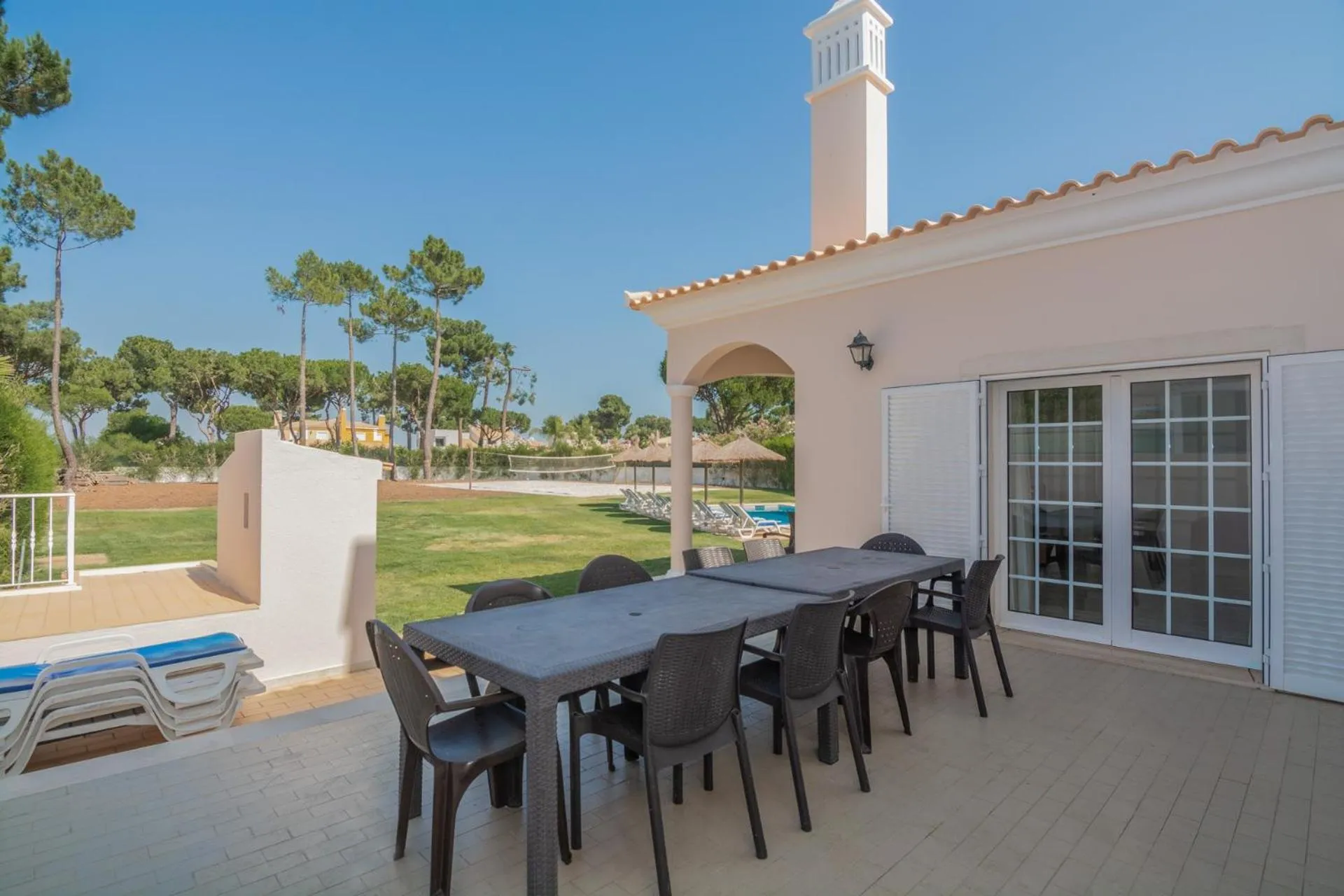 Patio in 8-Bed Villa in Vilamoura-Sleeps-Playground-Pool