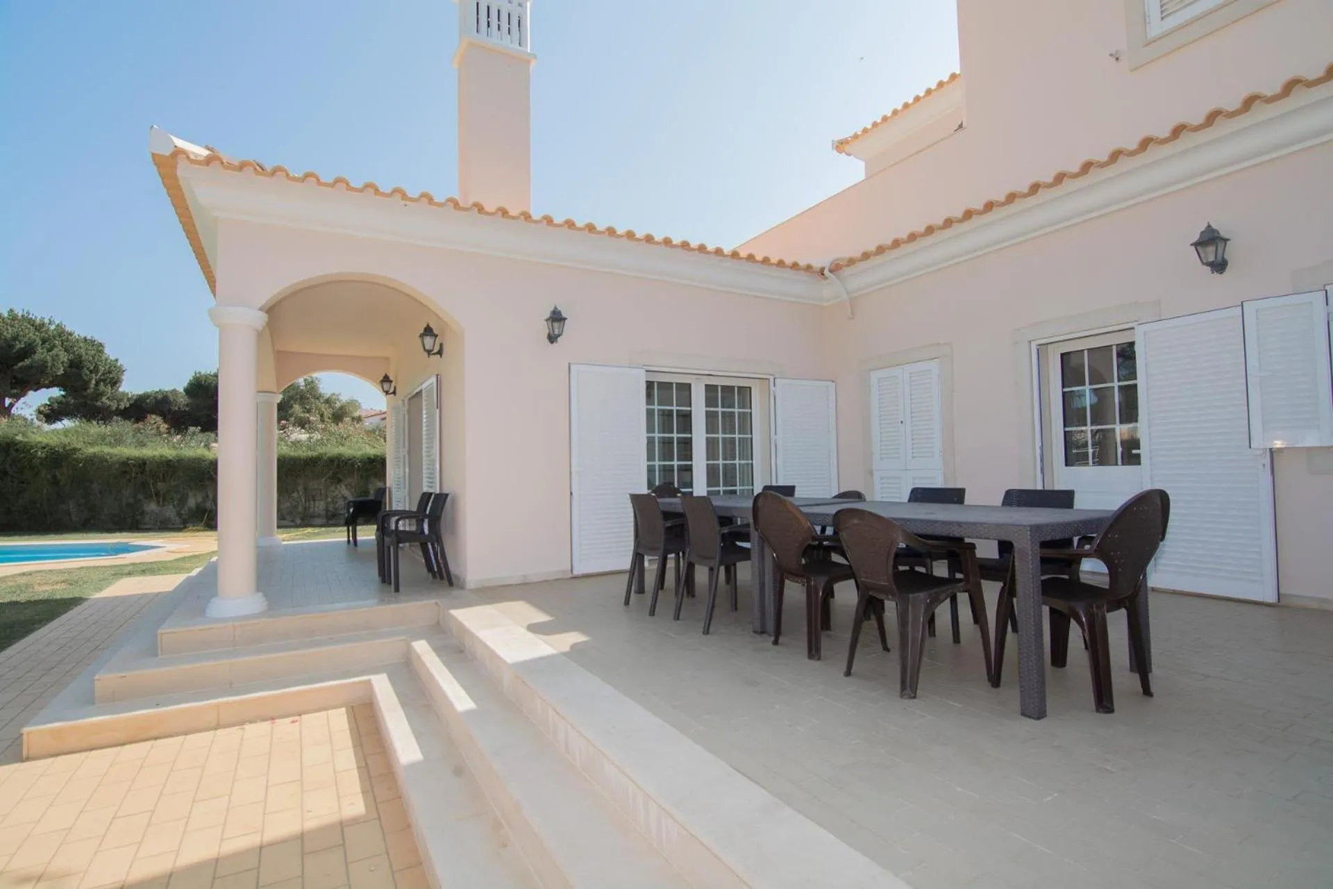 Patio in 8-Bed Villa in Vilamoura-Sleeps-Playground-Pool