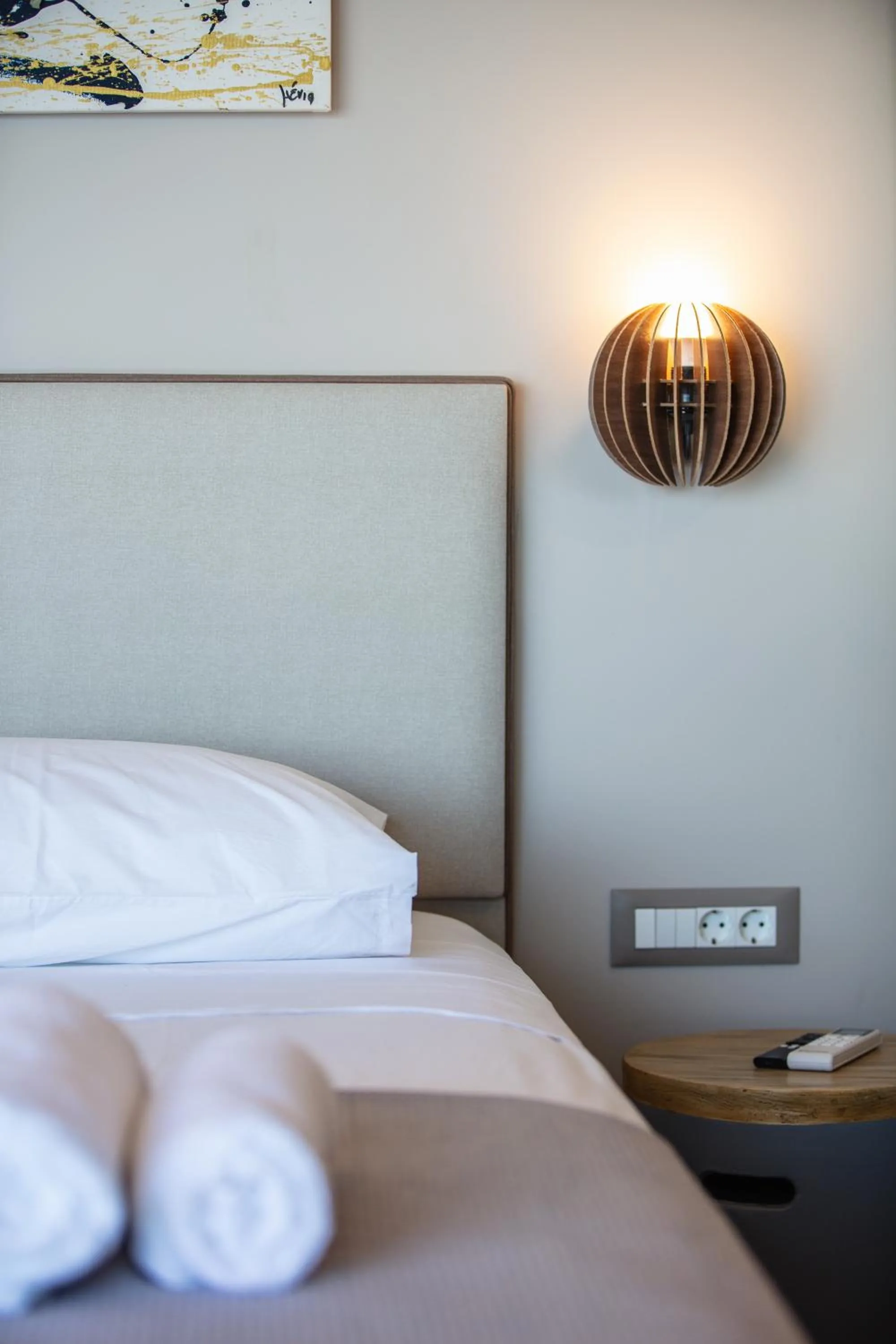 Bed in Skipper Beachfront Suites