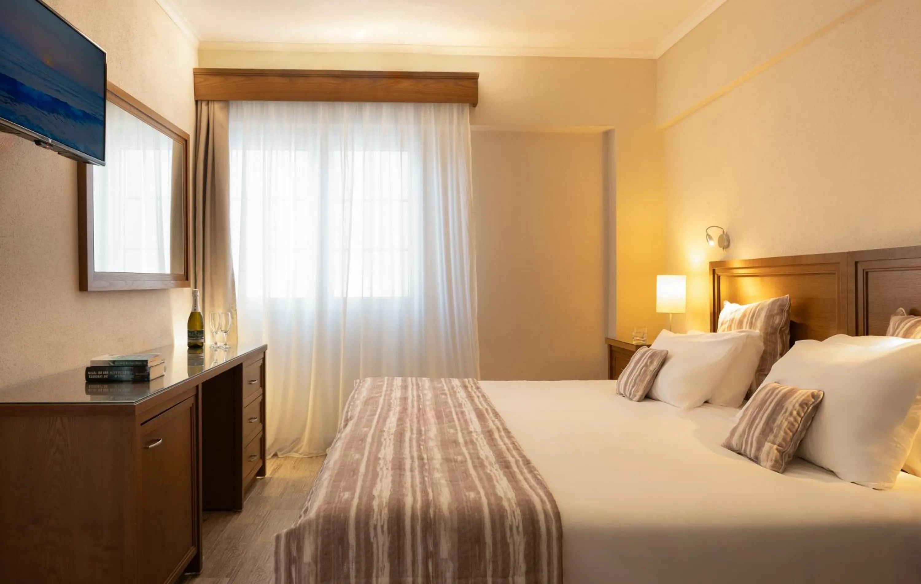 Bed in Mitsis Alexander the Great Hotel