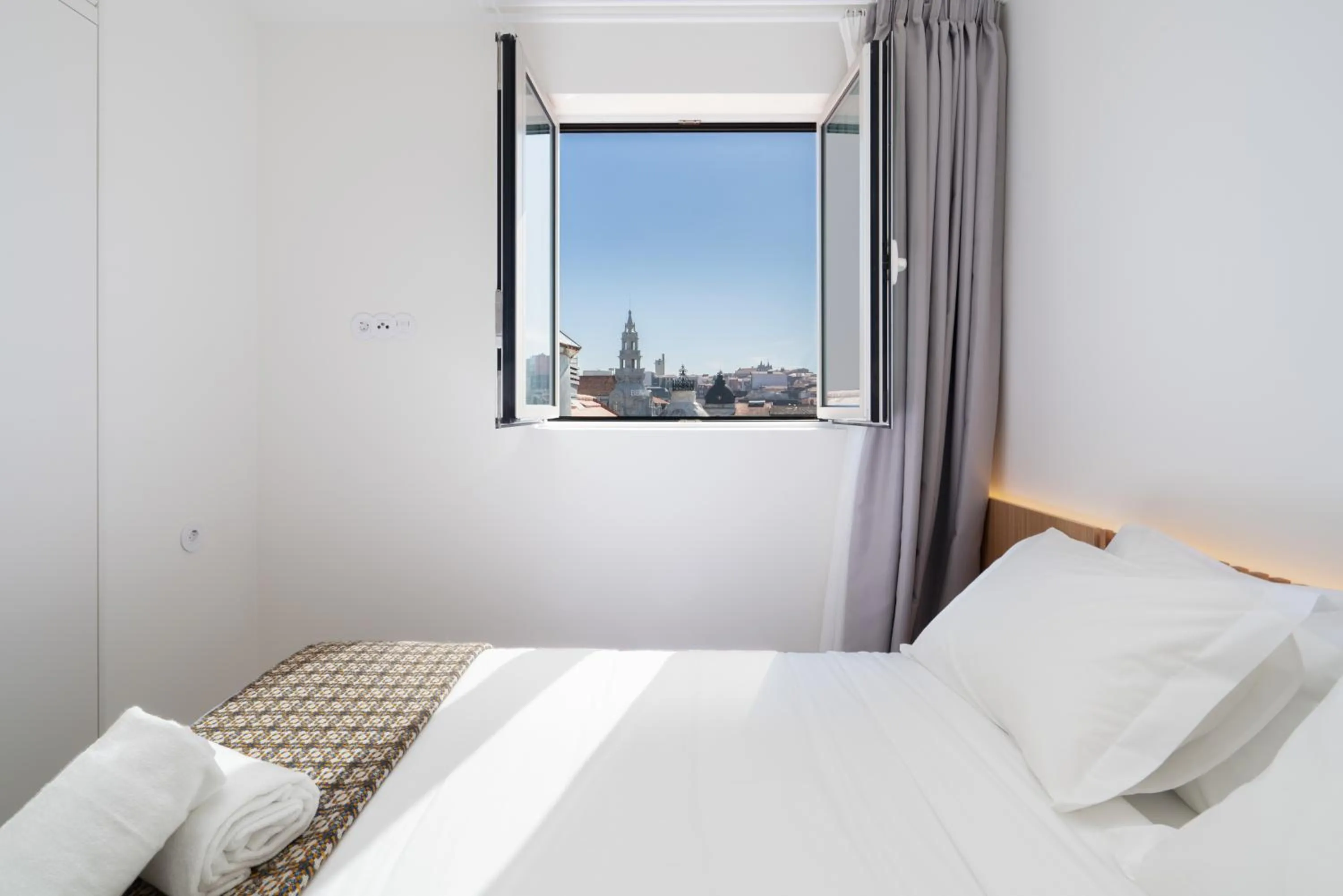 Bedroom in d'ALMA Boutique Hotel