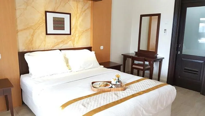 Bedroom, Bed in Avila Ketapan Rame Hotel