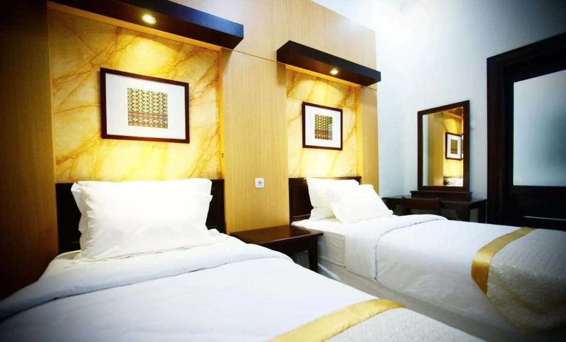 Bedroom, Bed in Avila Ketapan Rame Hotel