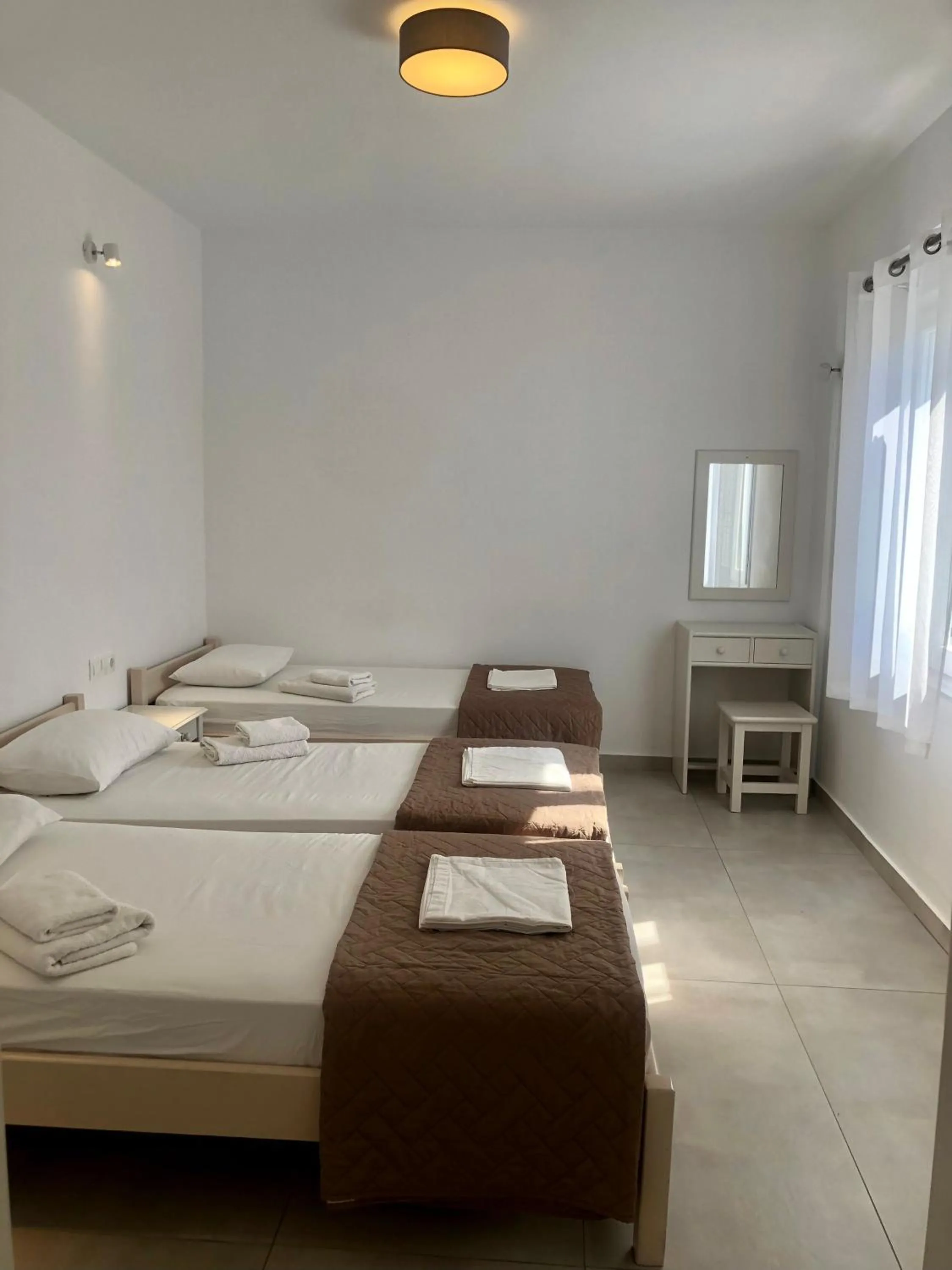 Photo of the whole room, Bed in Golden Sun