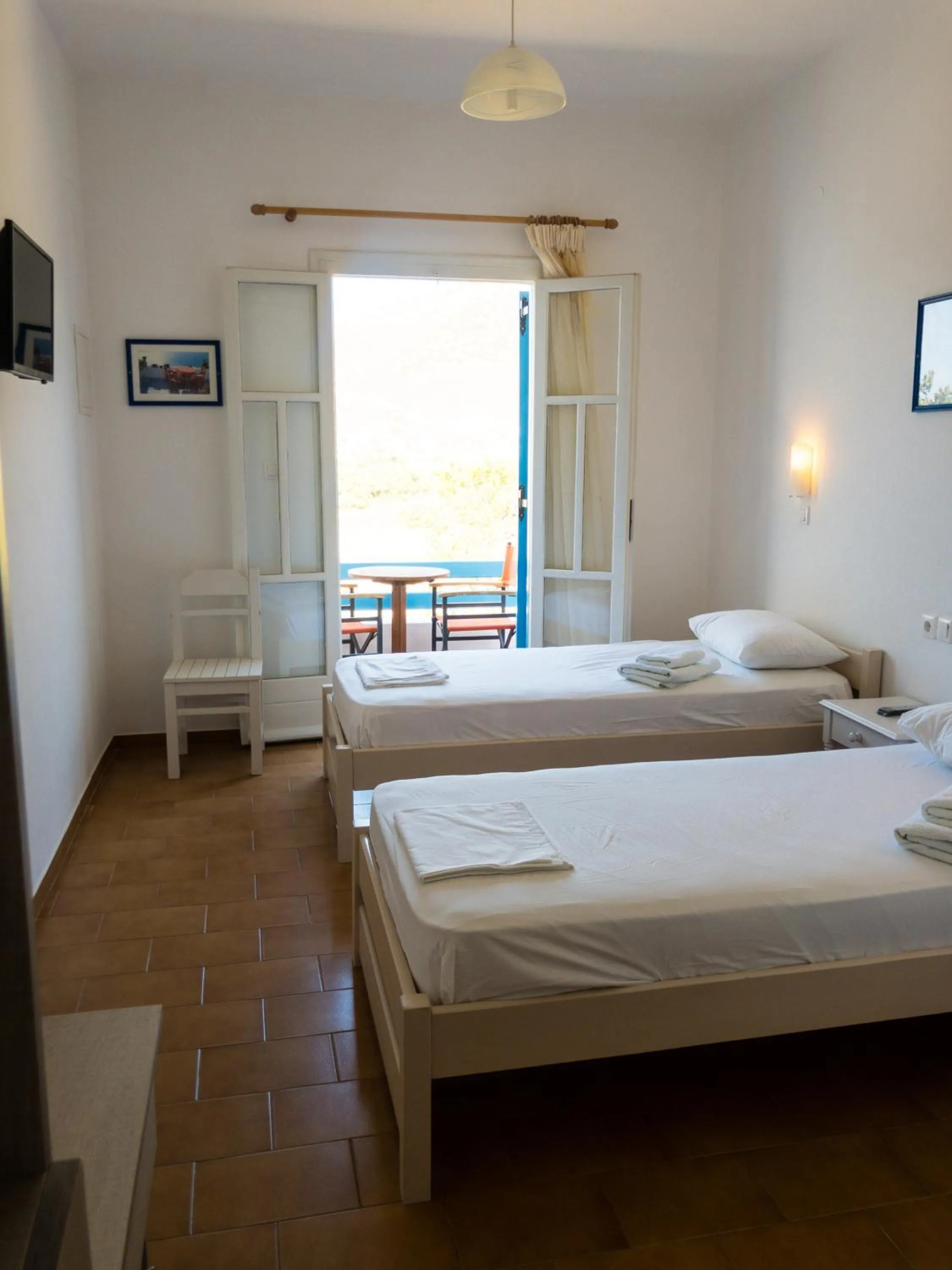 Photo of the whole room, Bed in Golden Sun
