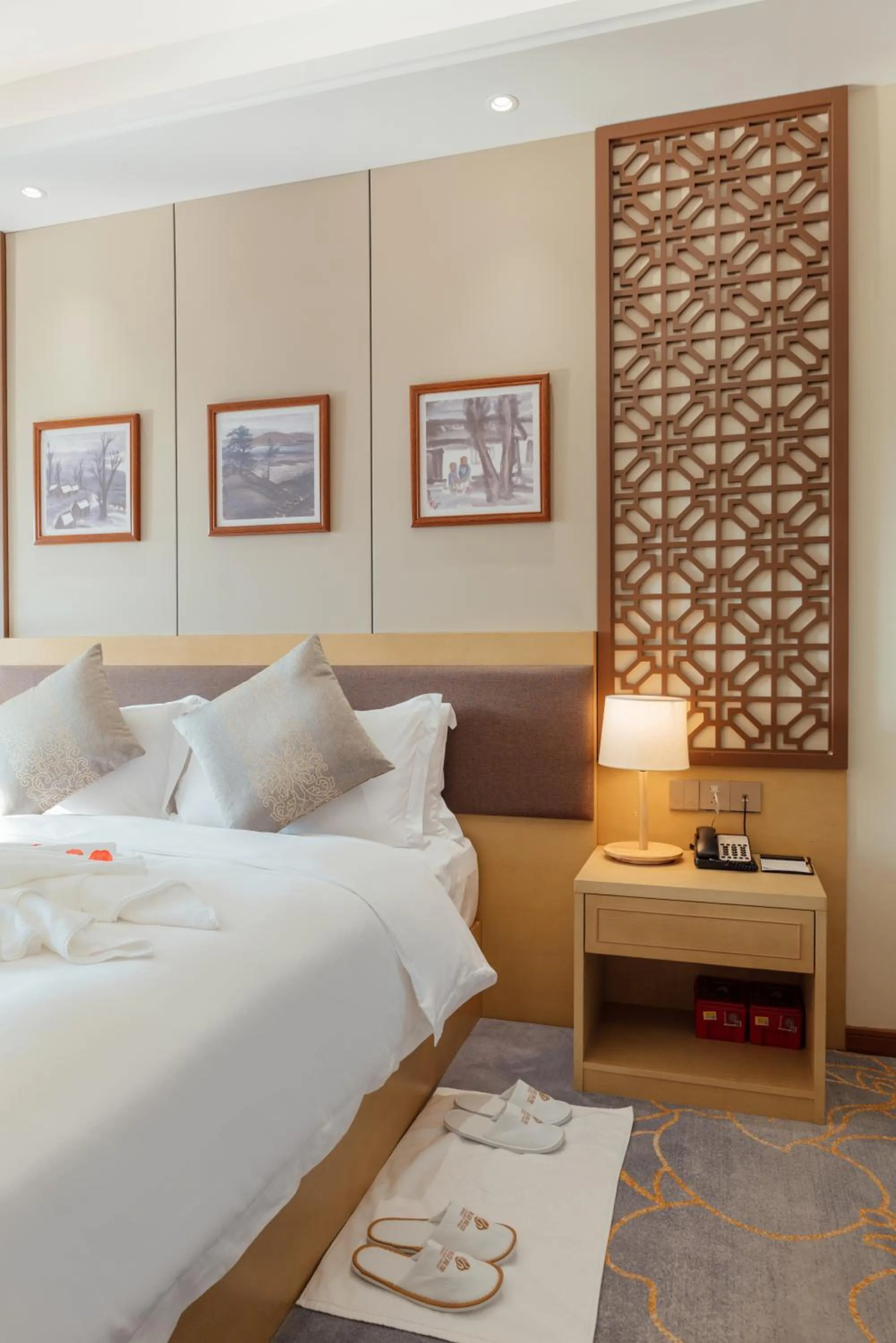 Bed in White Swan Guest House MeiZhou