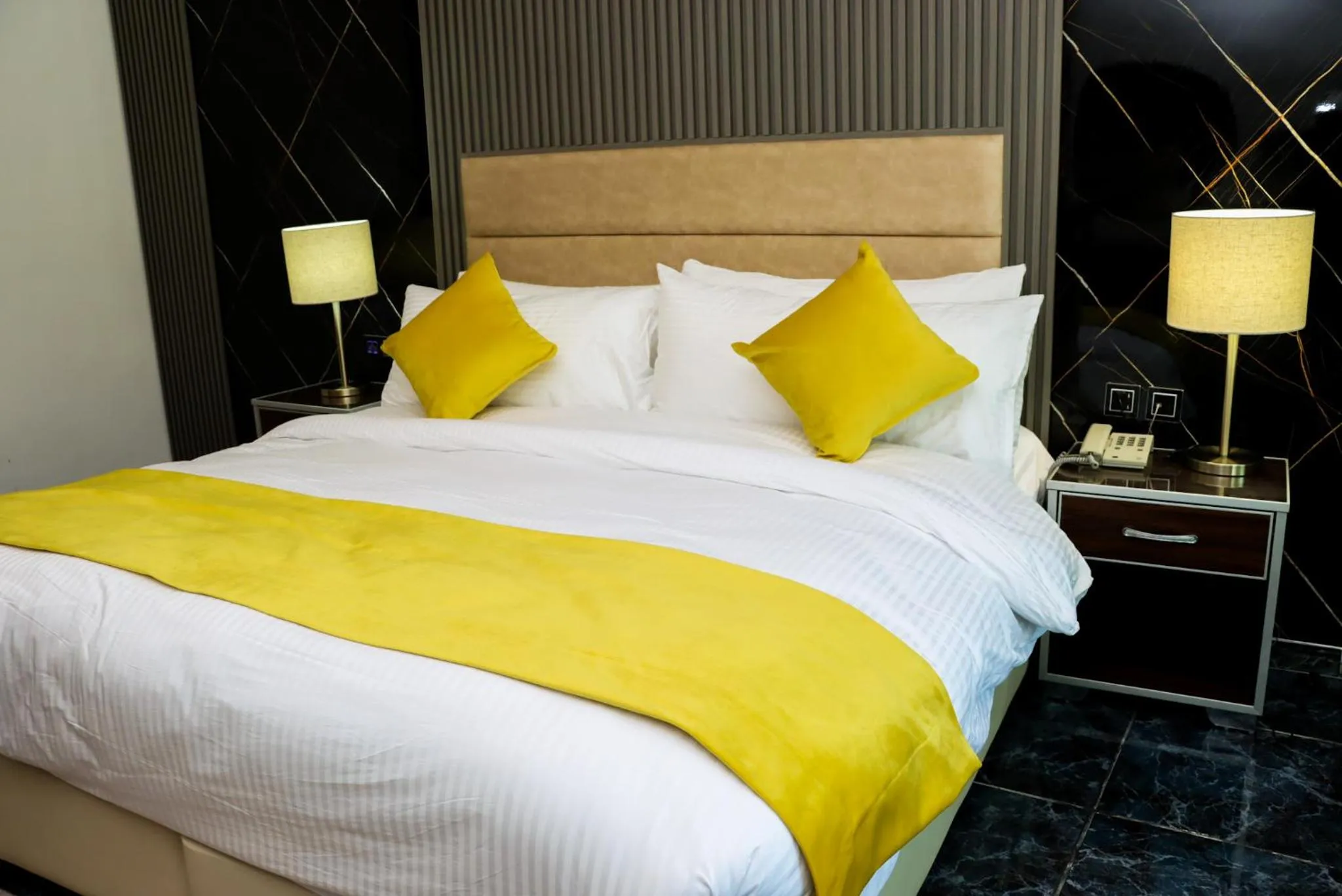 Bed in The RN Hotels