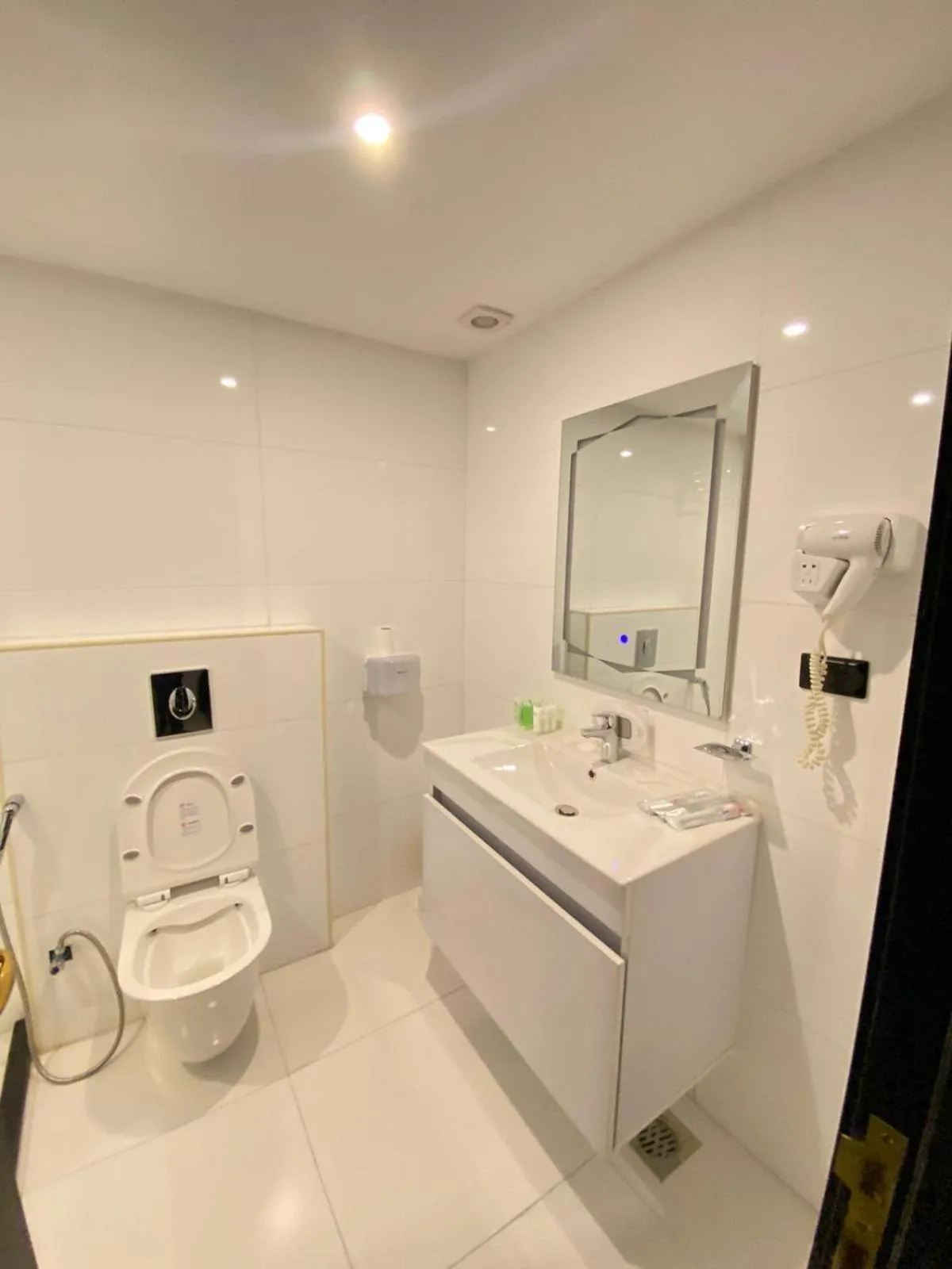 Toilet in The RN Hotels