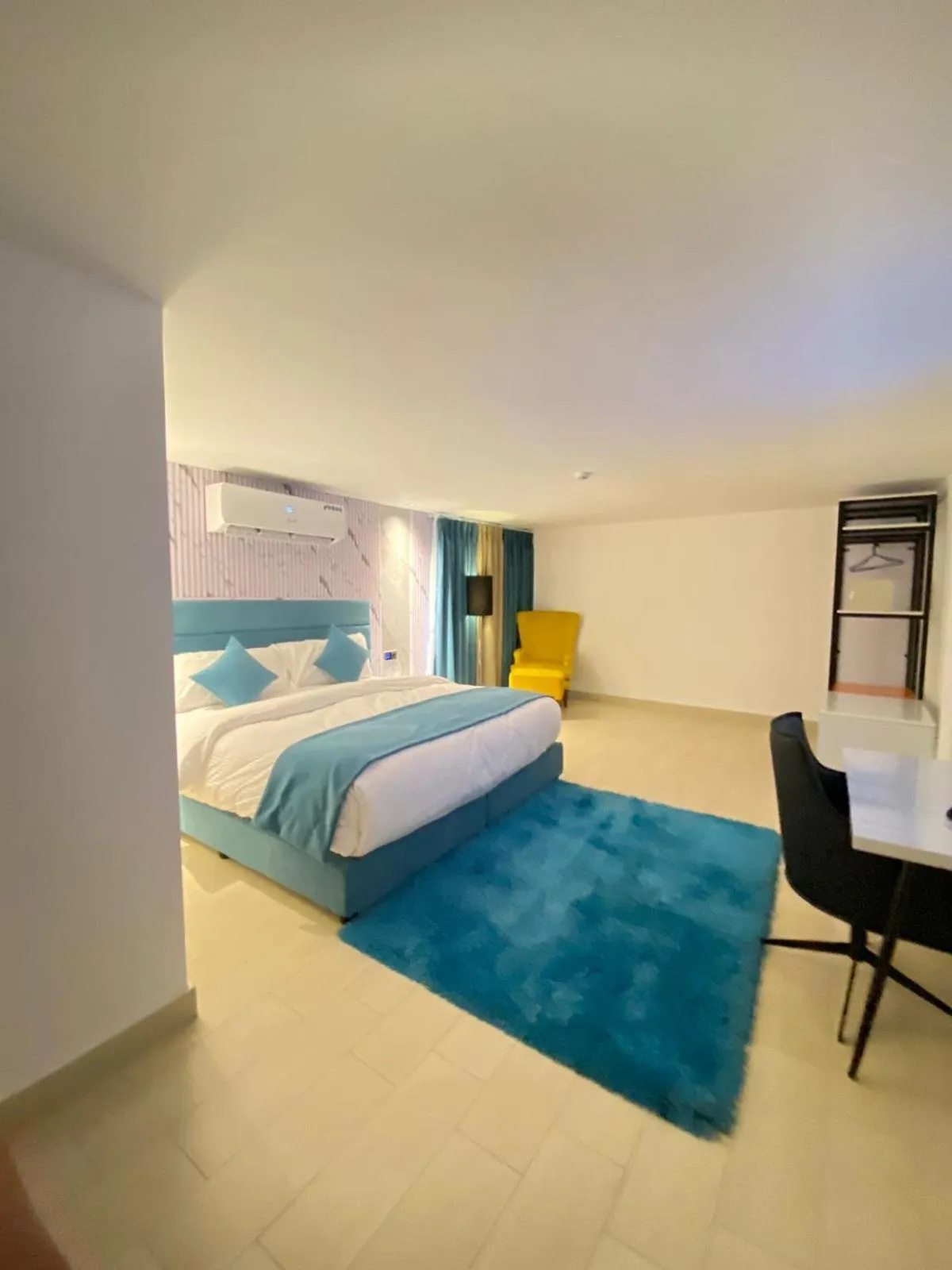 Bed in The RN Hotels