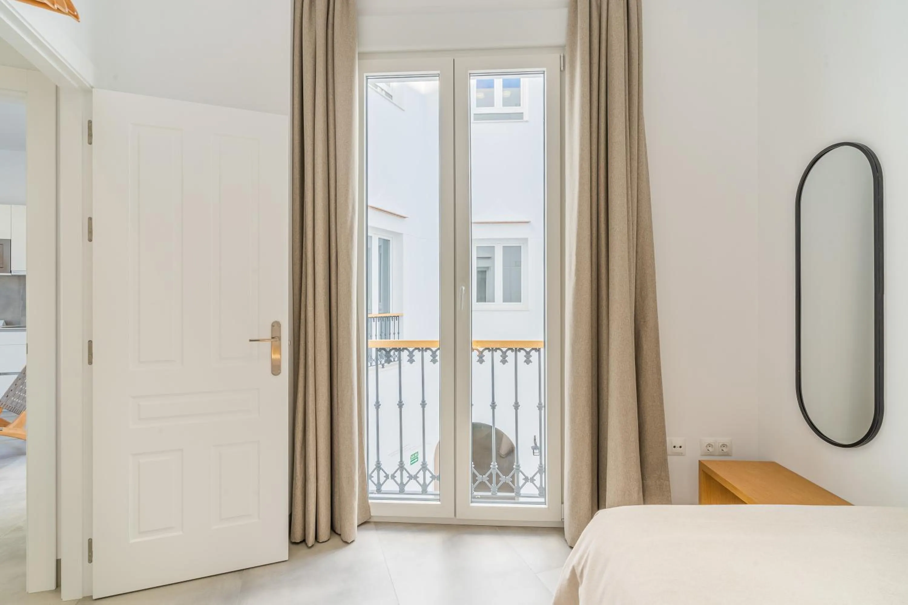 Bed in CASA DE LA VEGA SUITES