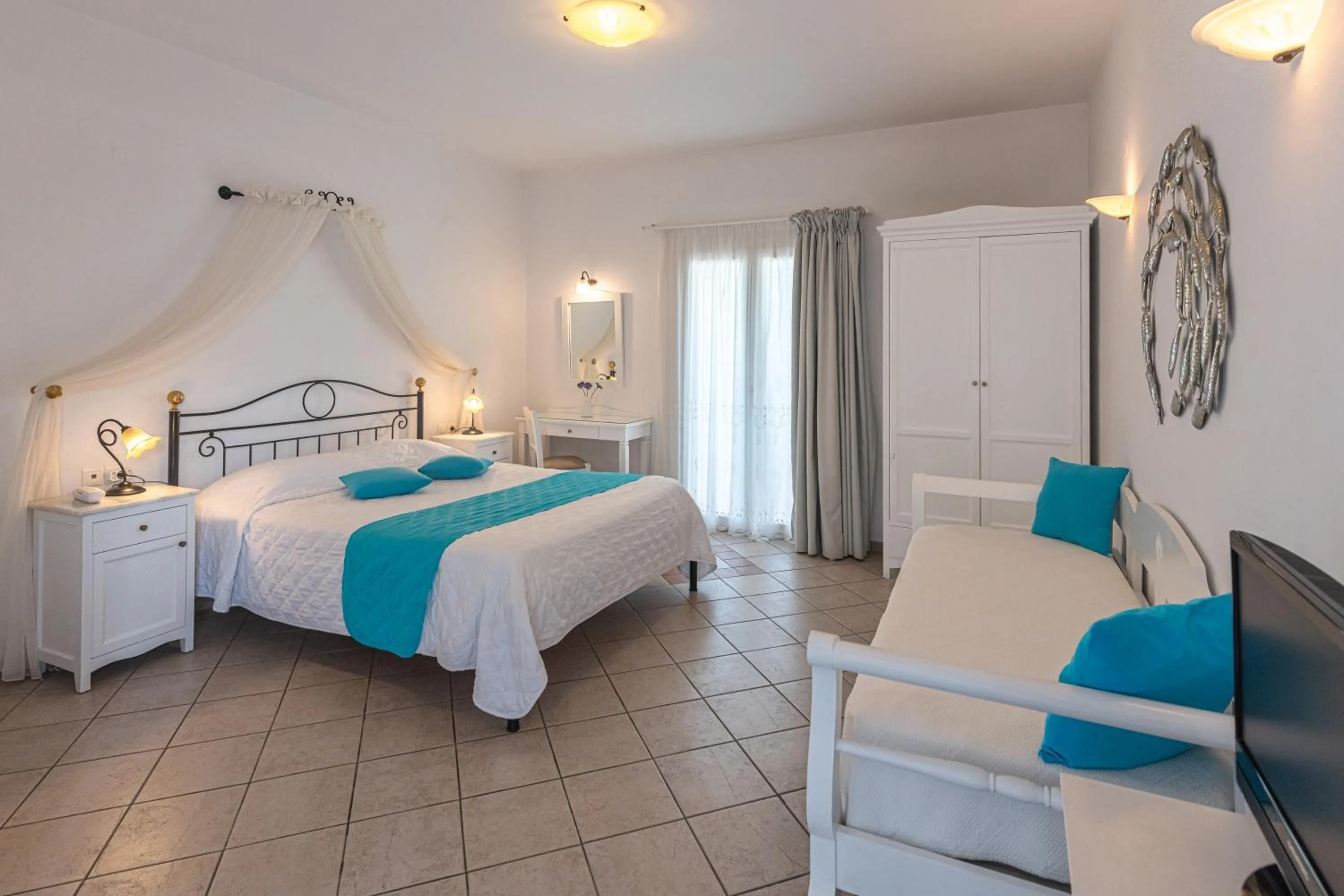 Bed in Reverie Santorini Hotel