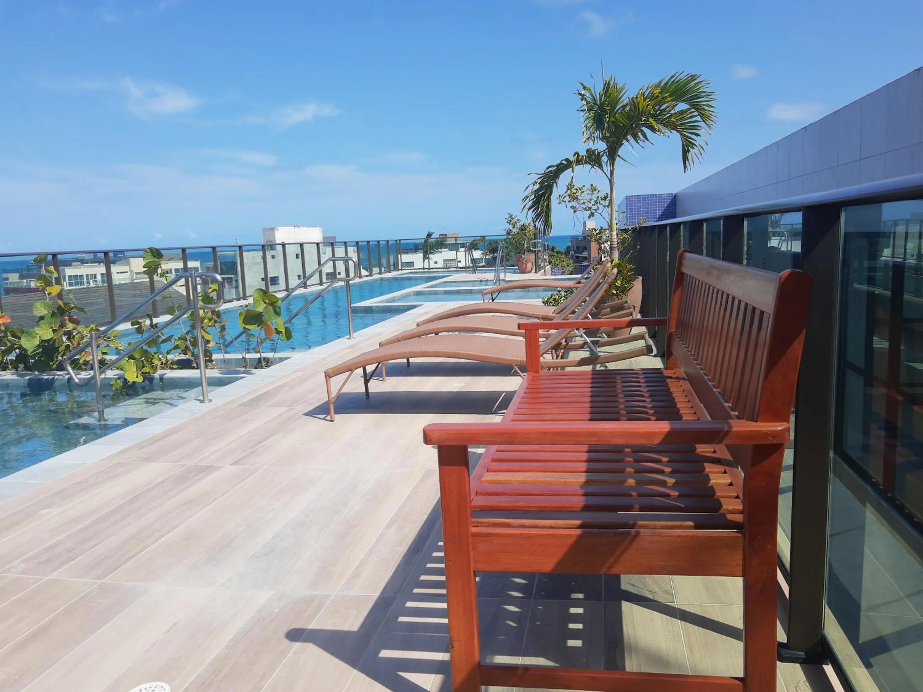Swimming pool in No centro de Porto de Galinhas Praia Flats Temporada - Porto Blue 03