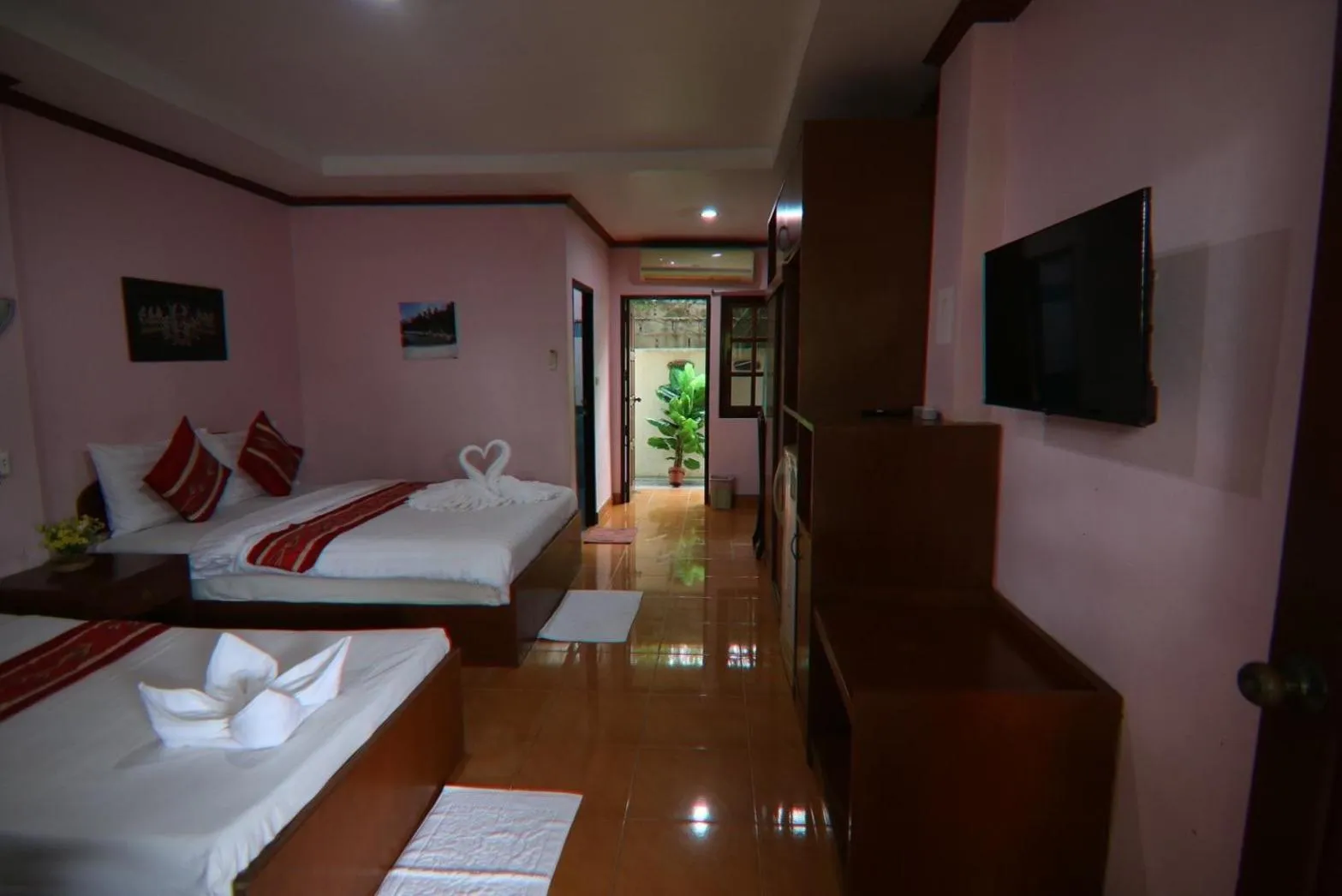 Bed in Coconut House Resort