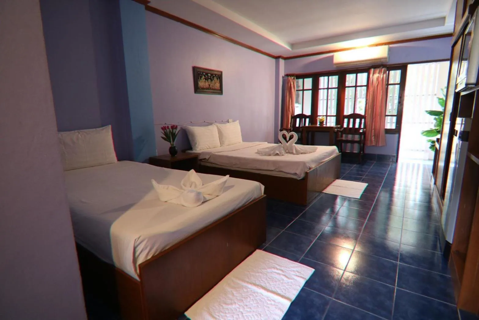 Bed in Coconut House Resort