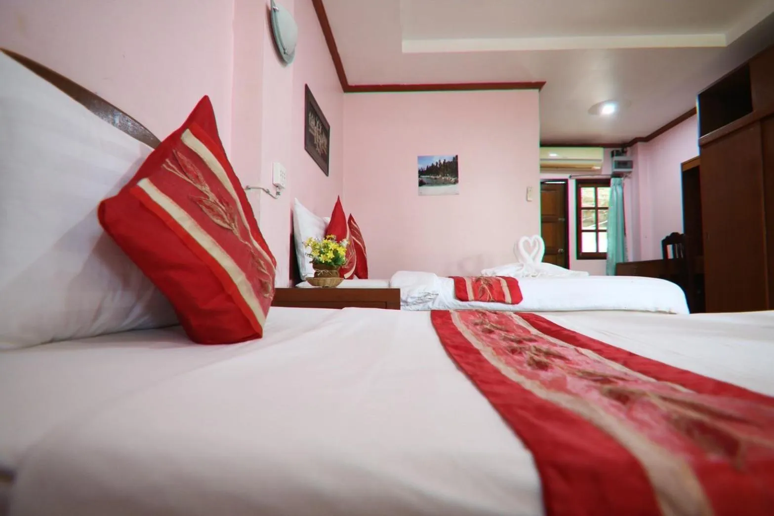 Bed in Coconut House Resort