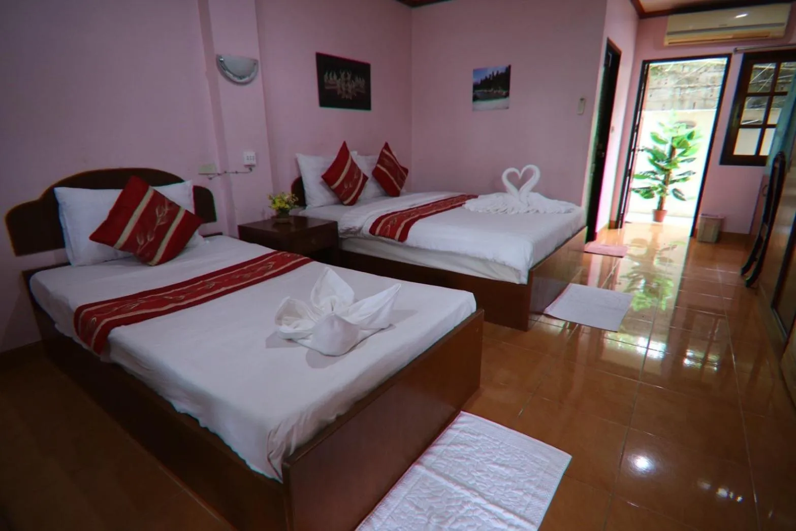 Bed in Coconut House Resort