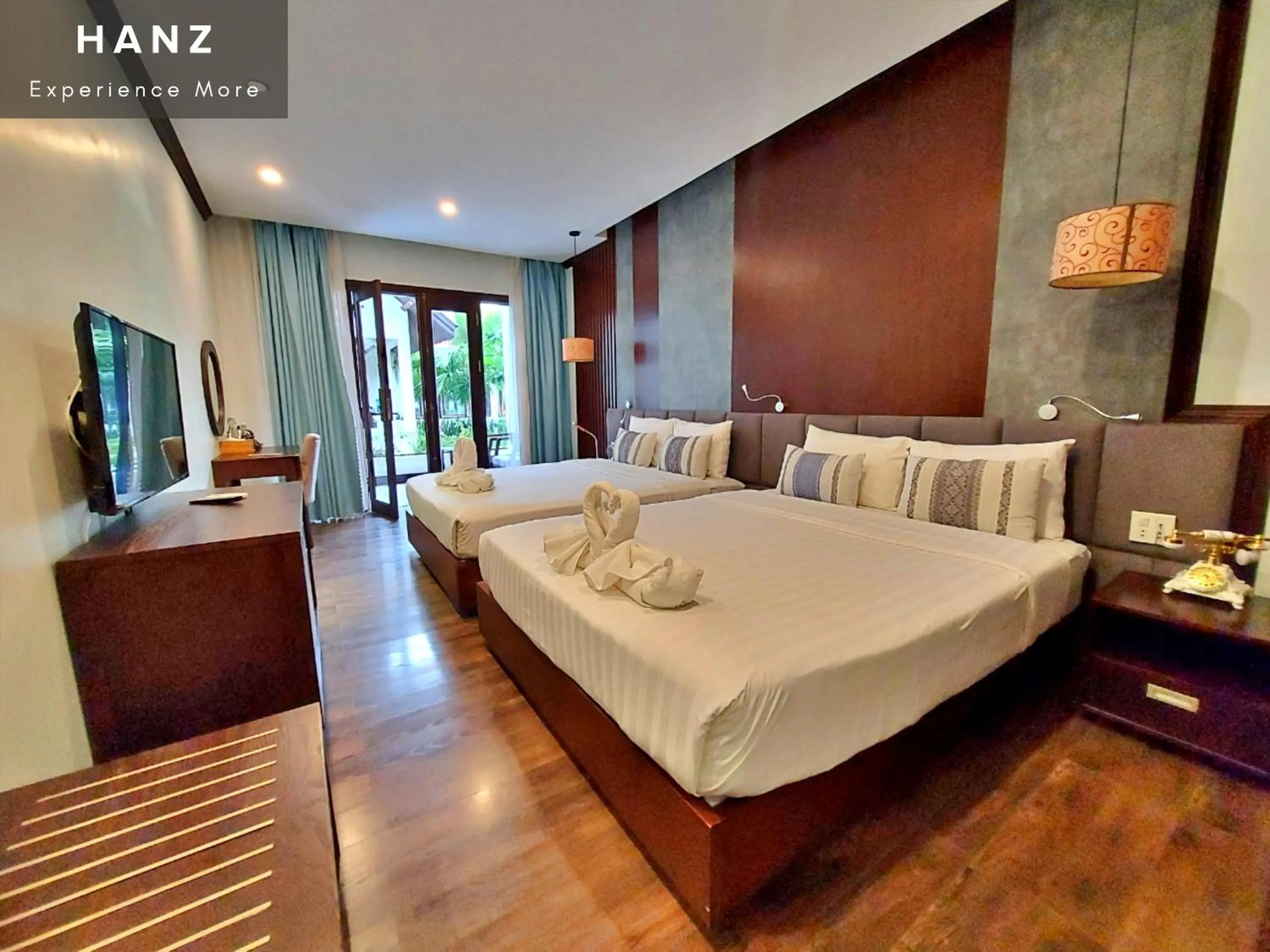 Bed in Sunrise Hotel Luang Prabang MekongRiver