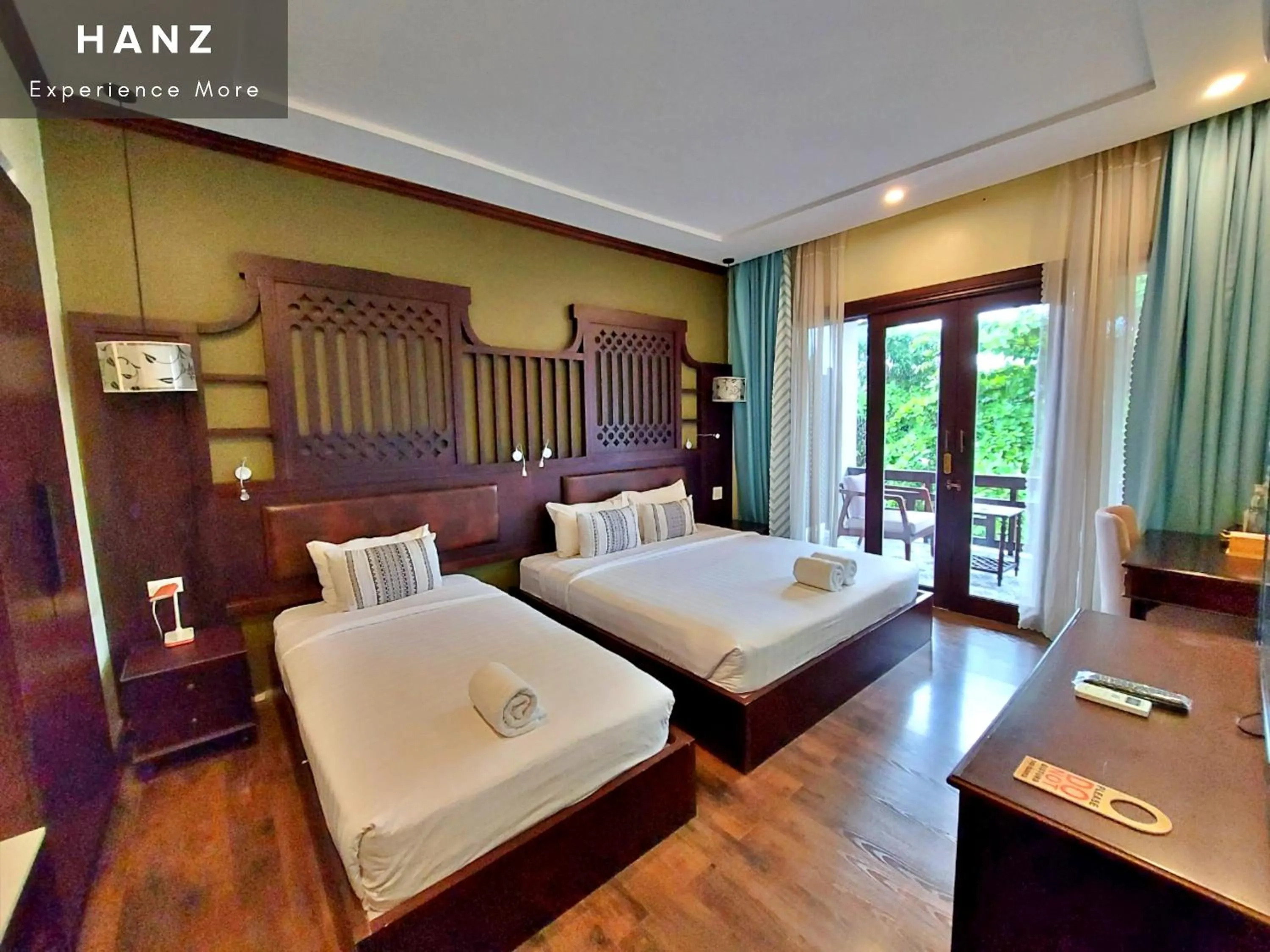 Bed in Sunrise Hotel Luang Prabang MekongRiver