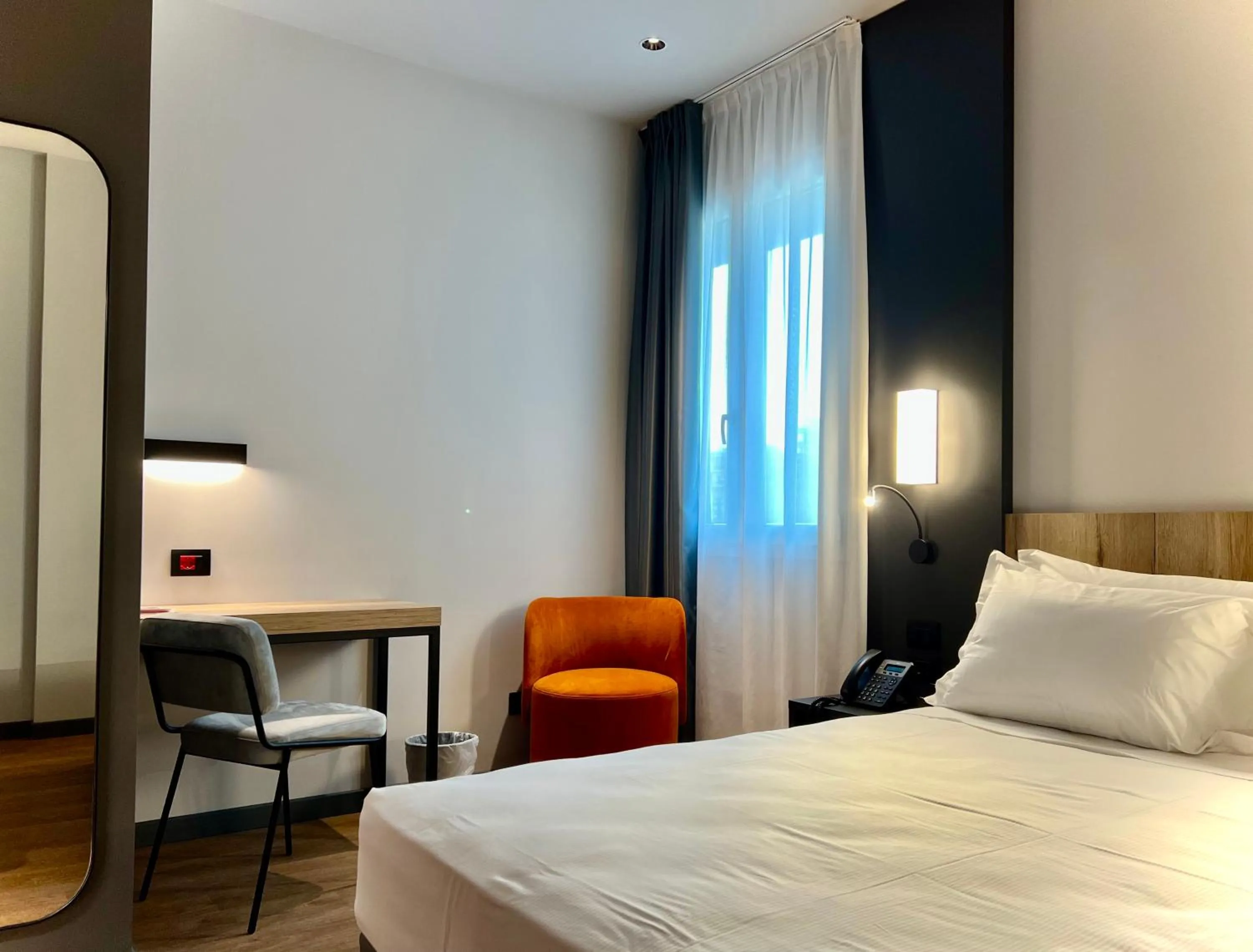 Bed in Hotel Leonessa