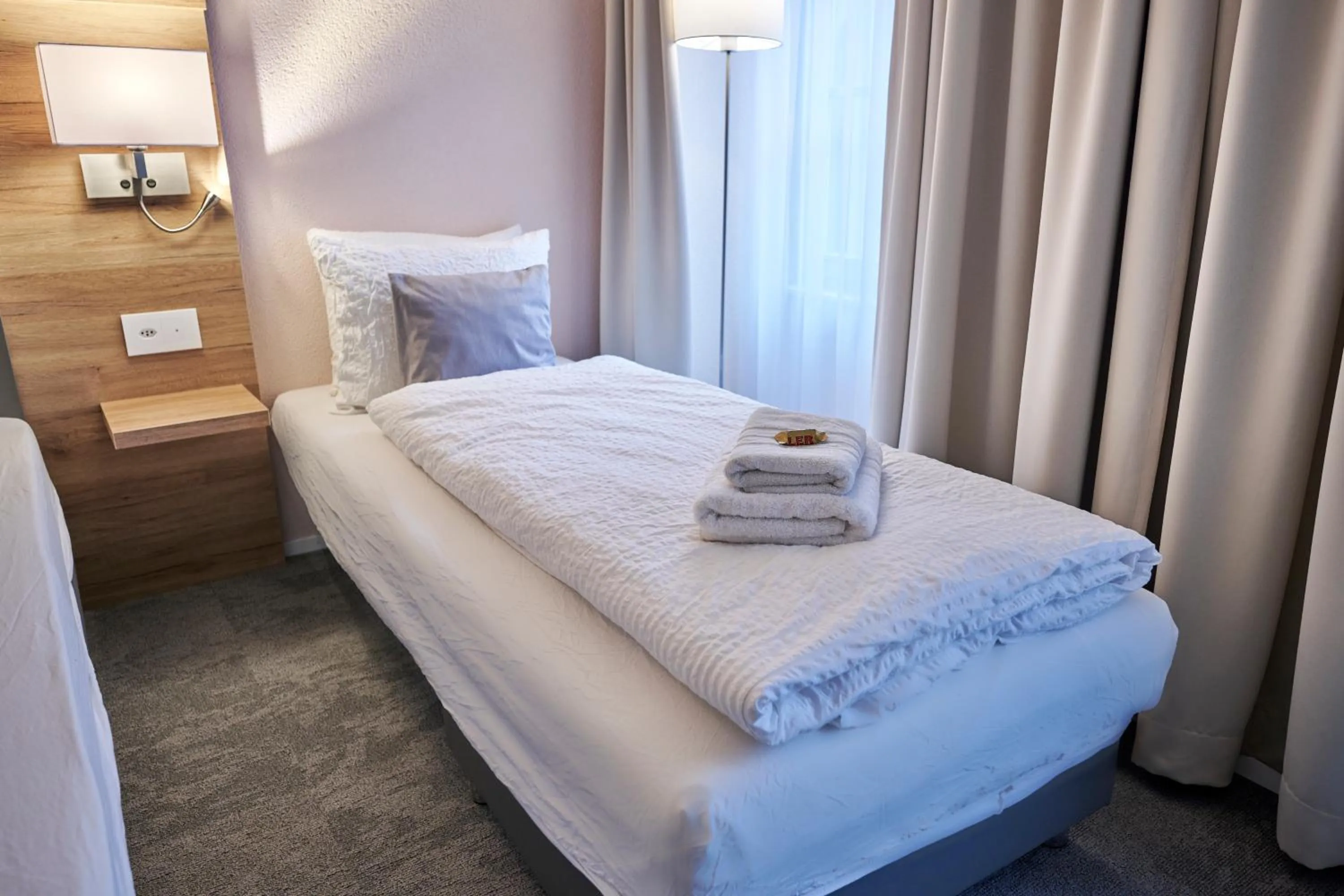 Bed in Aparthotel Krone - Self Check-In